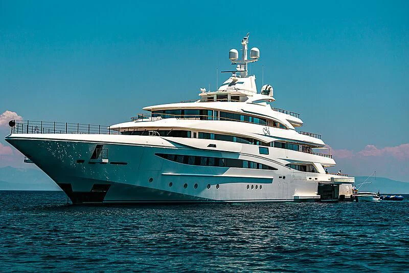 a large white ship in the water aboard MIMTEE Yacht for Sale