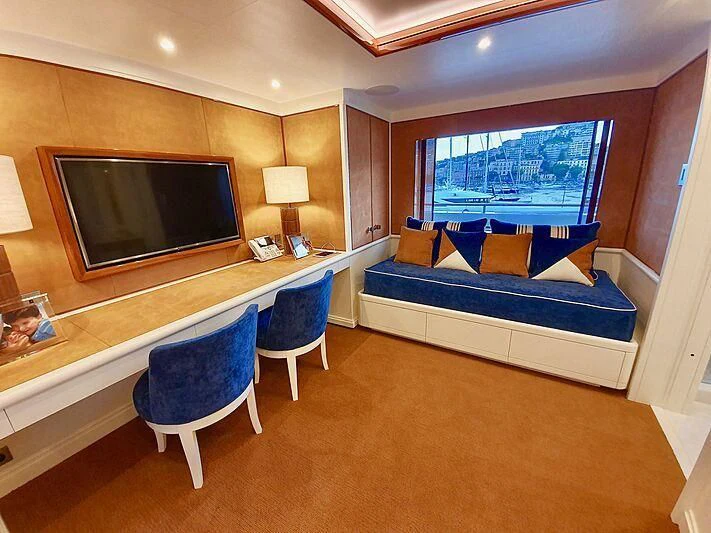 a hotel room with a bed and a tv aboard MIMTEE Yacht for Sale