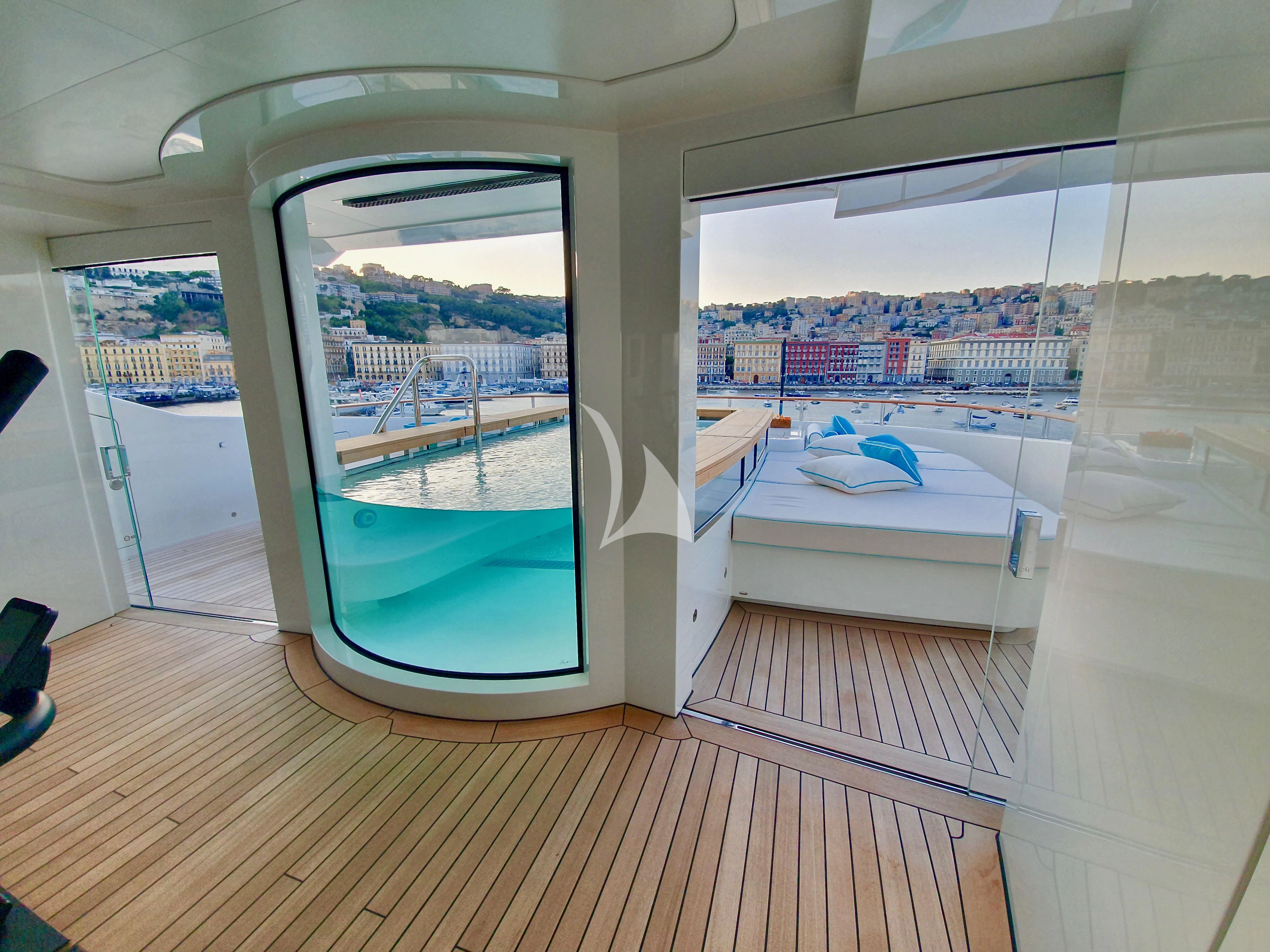 a room with a large window aboard MIMTEE Yacht for Sale