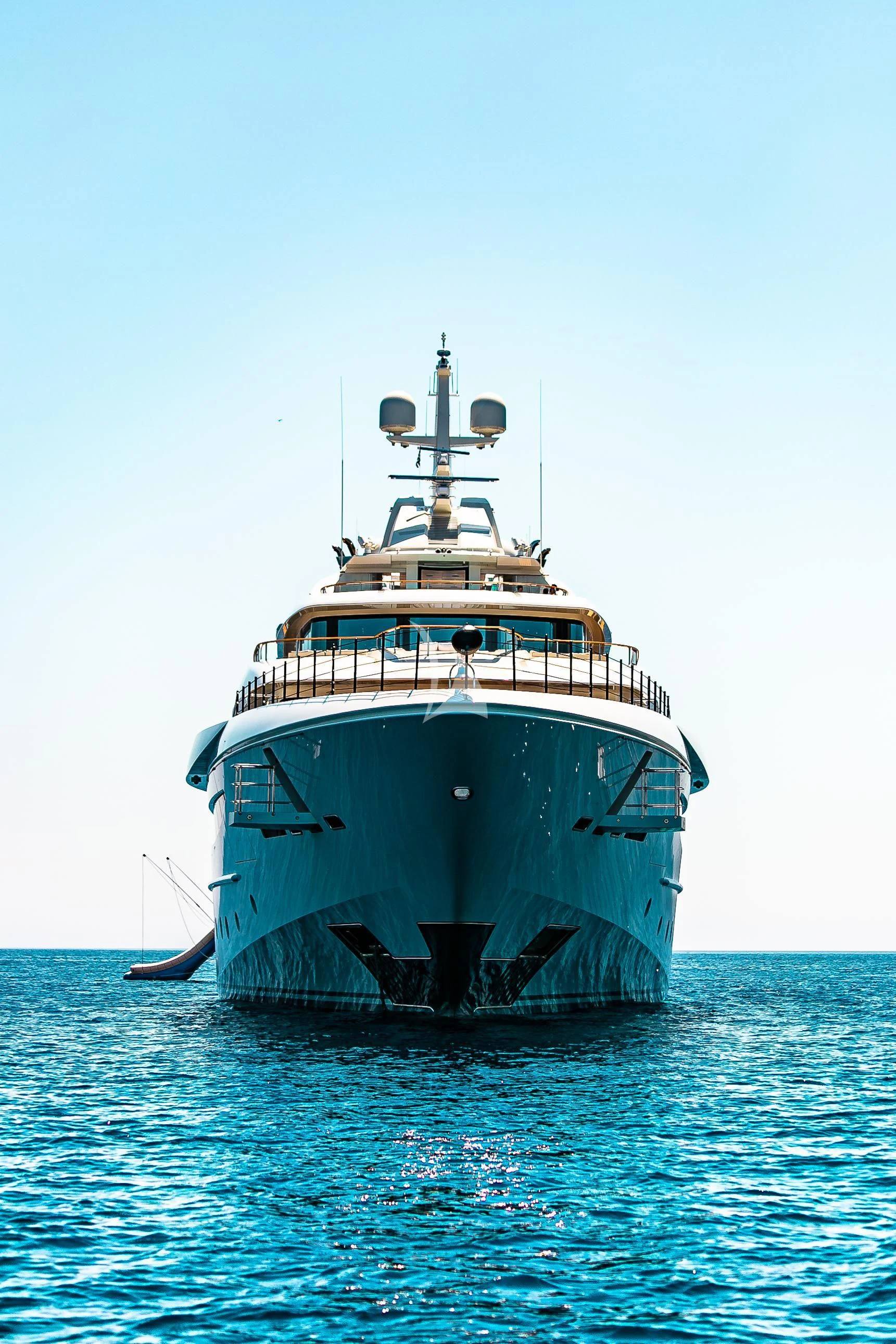 a large boat in the water aboard MIMTEE Yacht for Sale