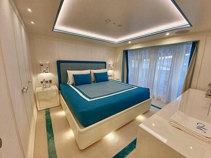 a bed in a room aboard MIMTEE Yacht for Sale