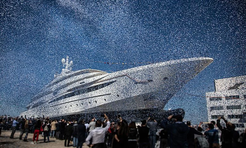 a group of people standing in front of a space ship aboard MIMTEE Yacht for Sale