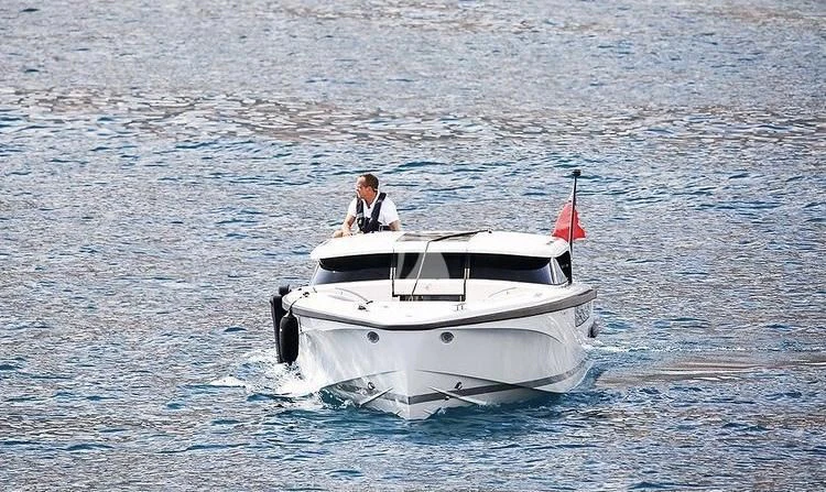 two people in a small boat aboard MIMTEE Yacht for Sale