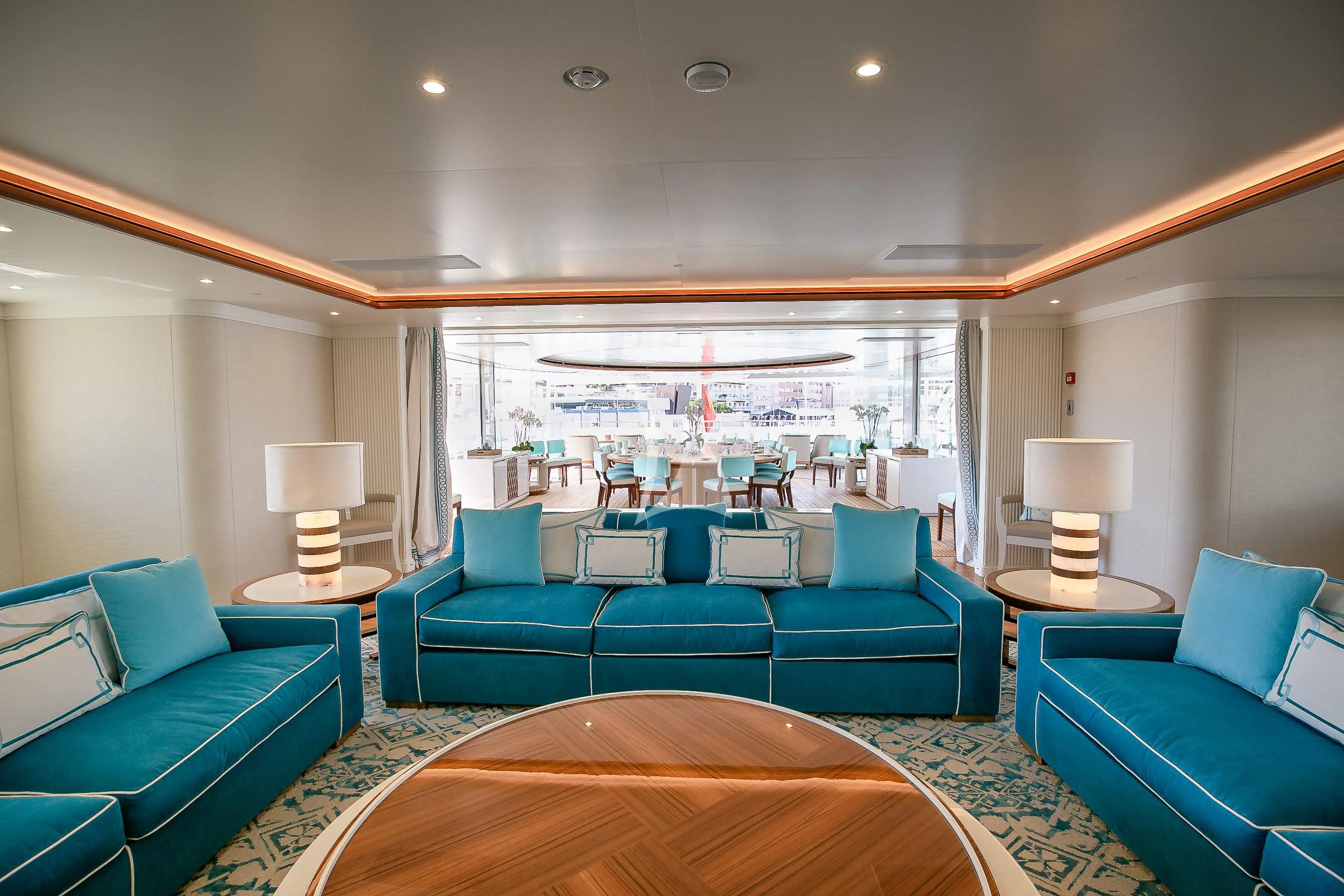 a large living room with a large window aboard MIMTEE Yacht for Sale
