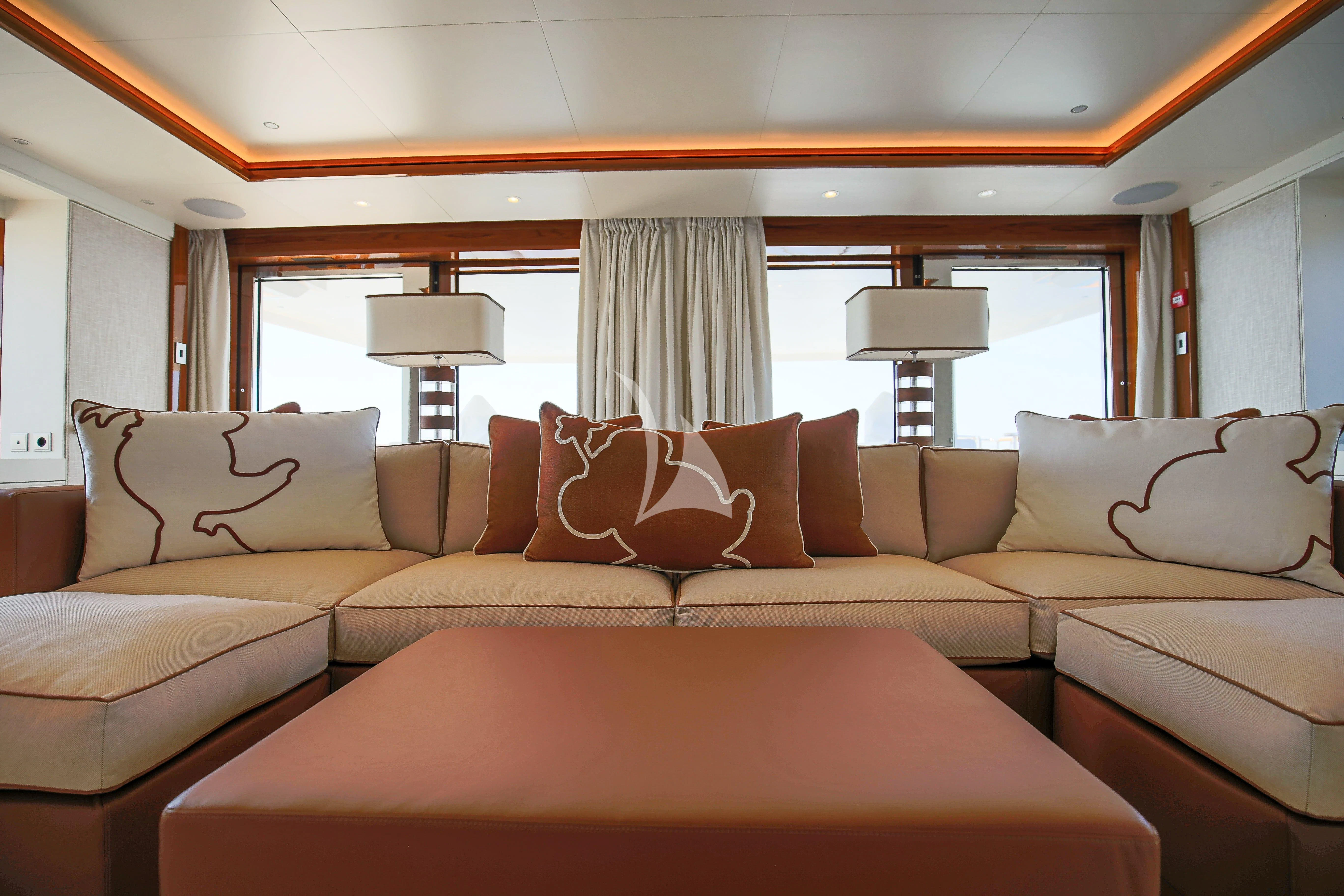 a living room with a couch aboard MIMTEE Yacht for Sale