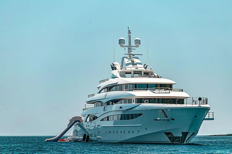 a large white boat in the water aboard MIMTEE Yacht for Sale