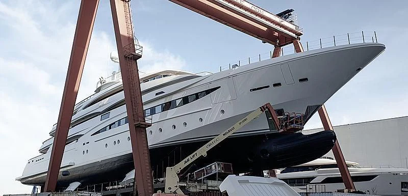 a boat docked at a pier aboard MIMTEE Yacht for Sale