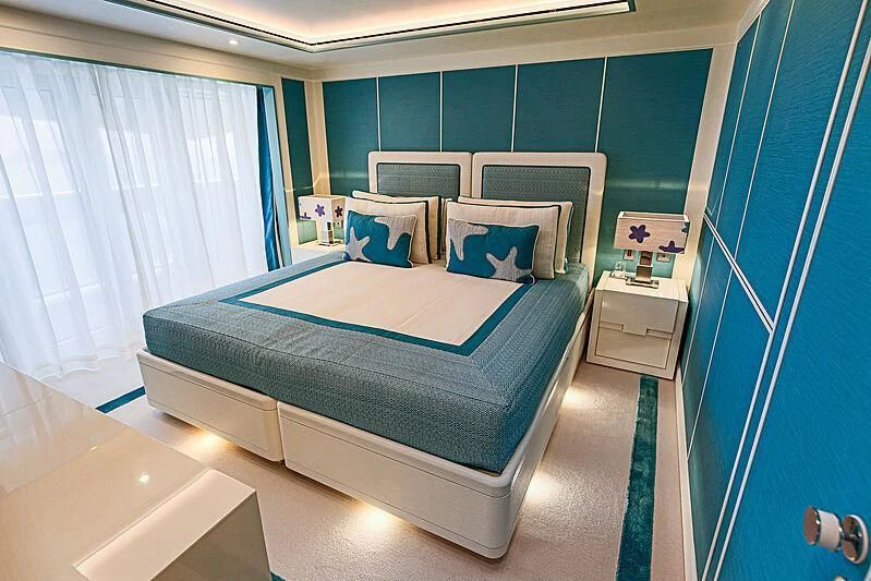 a bed in a room aboard MIMTEE Yacht for Sale