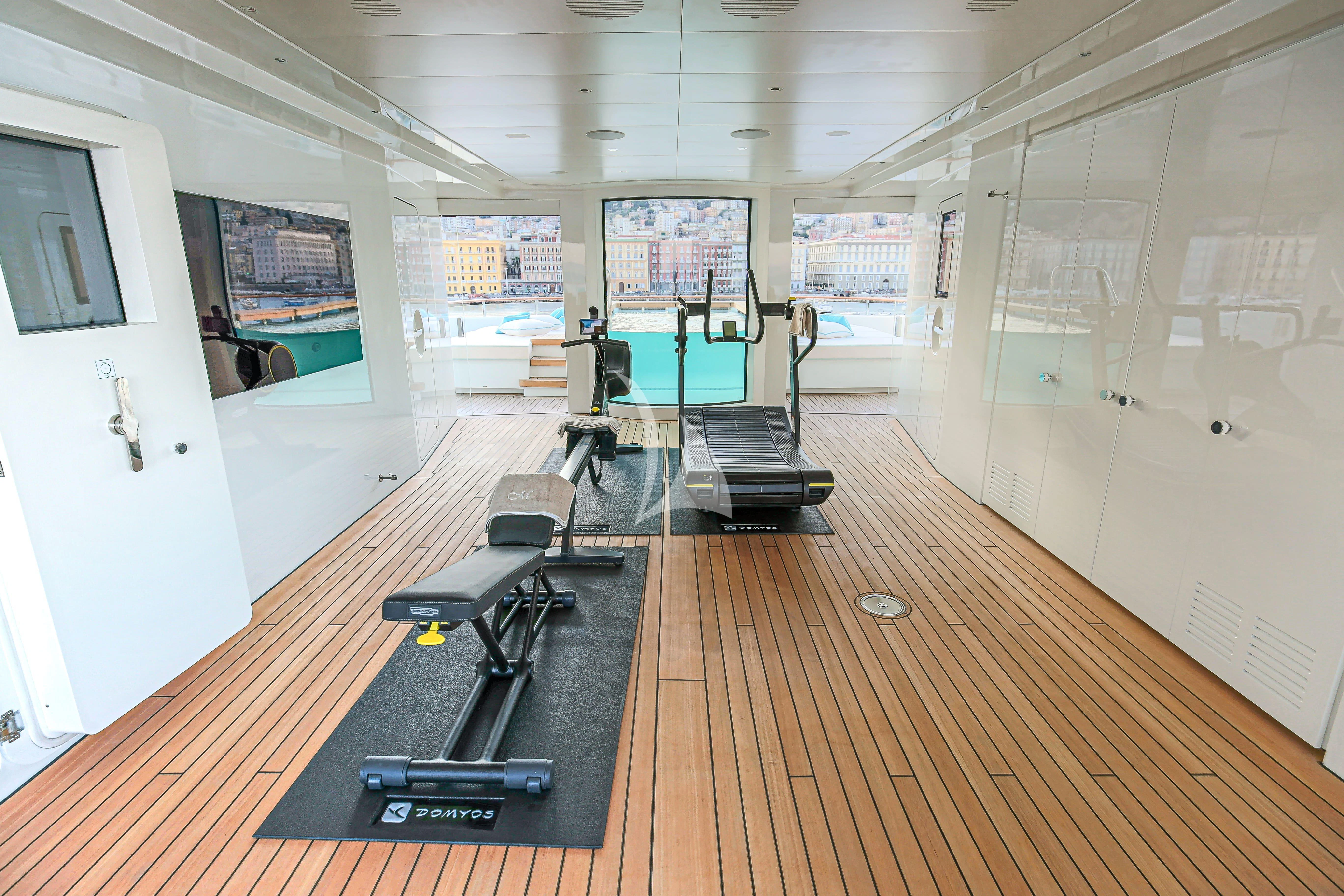 a gym with exercise equipment aboard MIMTEE Yacht for Sale