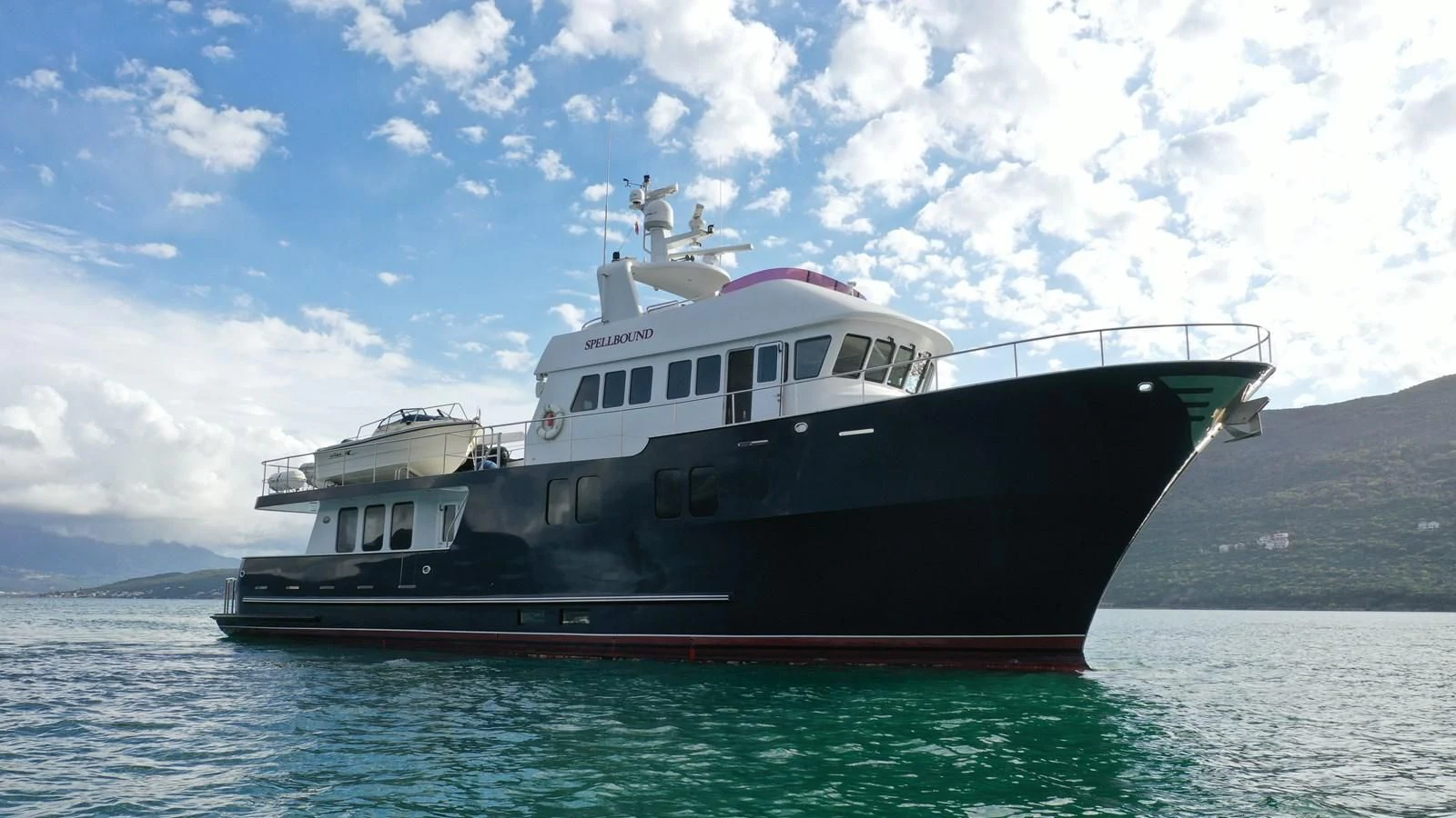 a boat in the water aboard SPELLBOUND Yacht for Sale