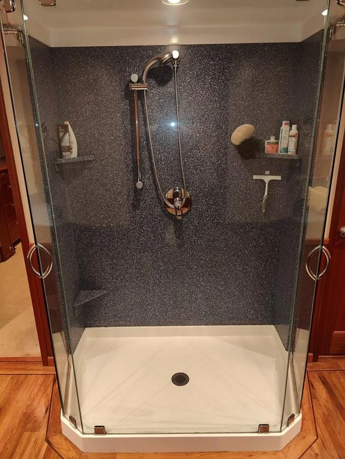 a shower with a glass door aboard SPELLBOUND Yacht for Sale