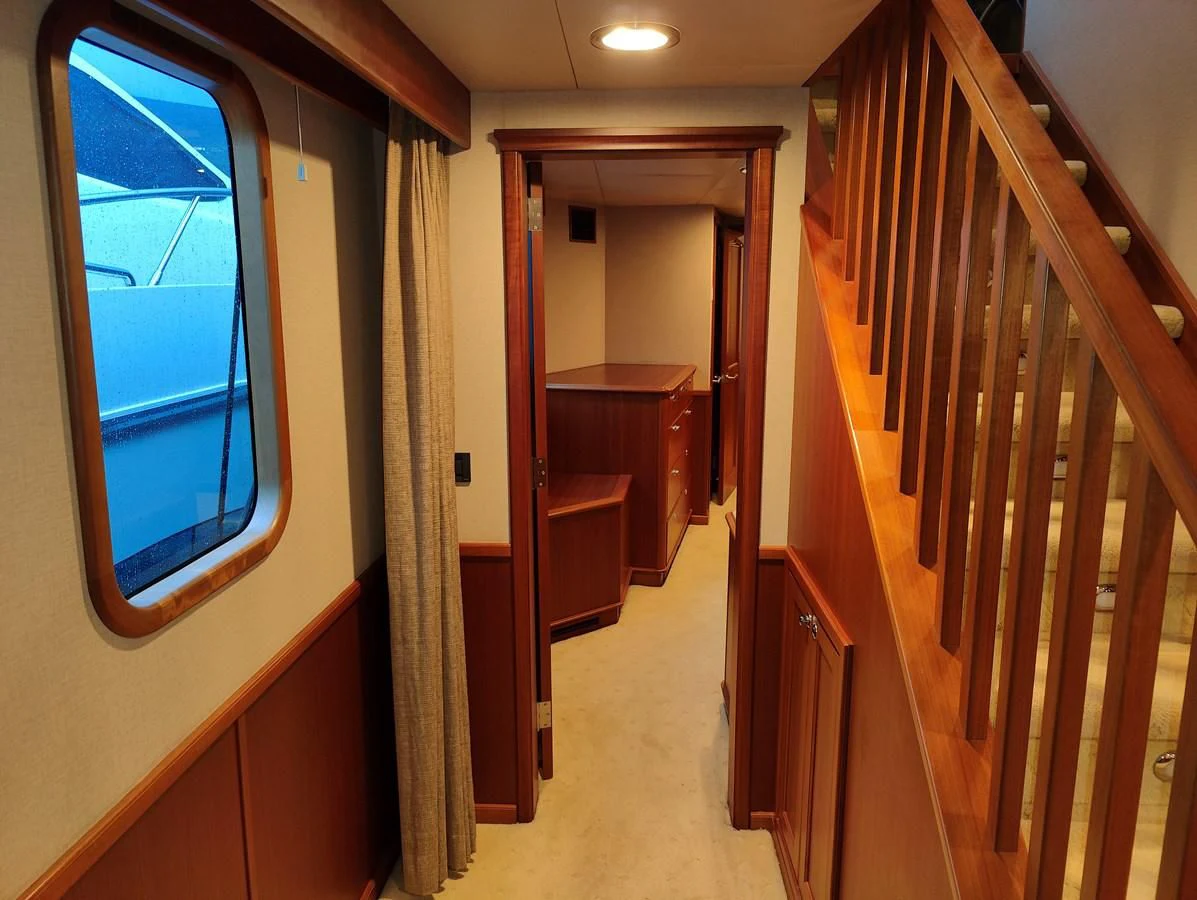 a hallway with wood floors aboard SPELLBOUND Yacht for Sale