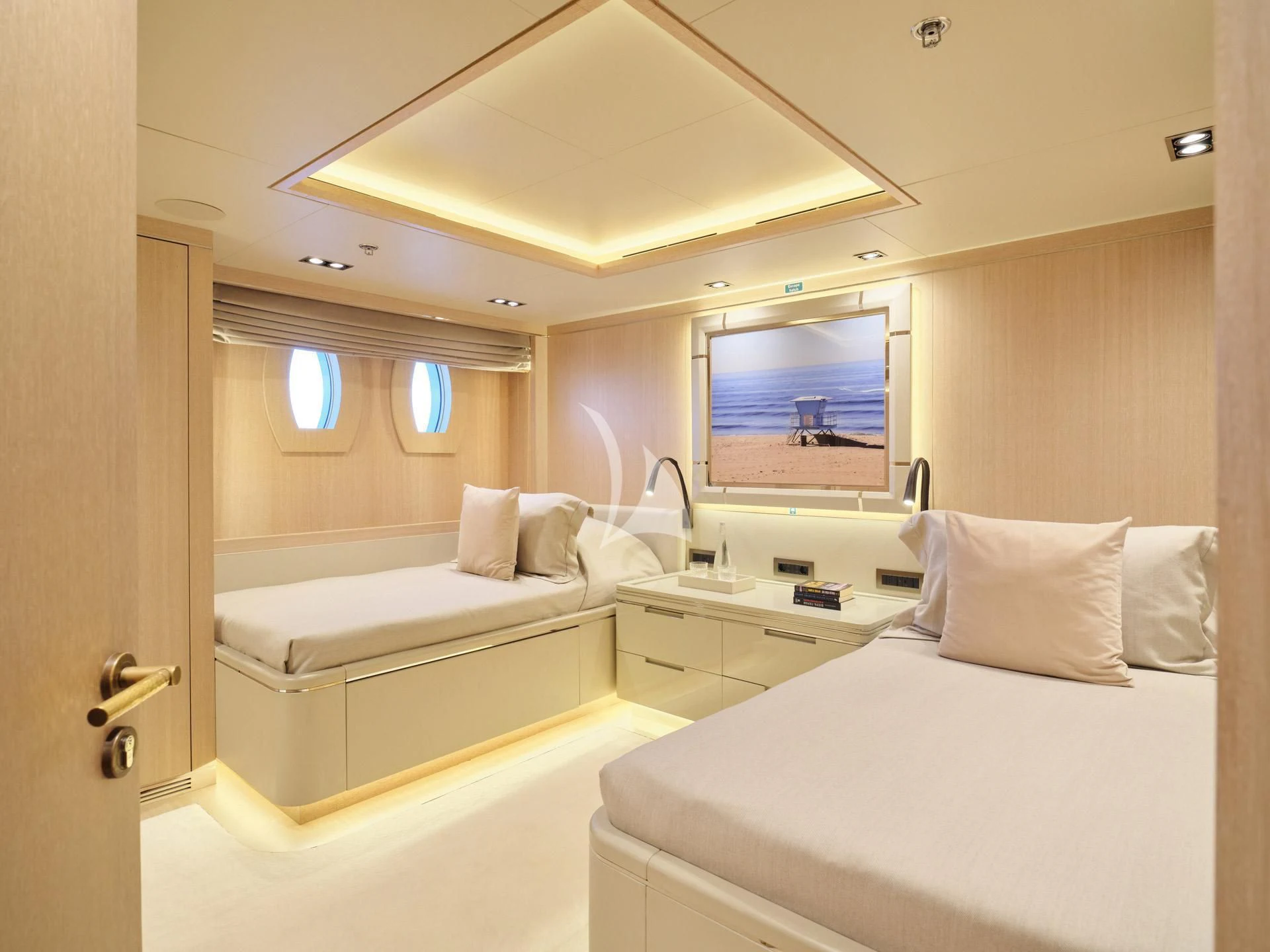 a room with two beds aboard JAZ Yacht for Charter