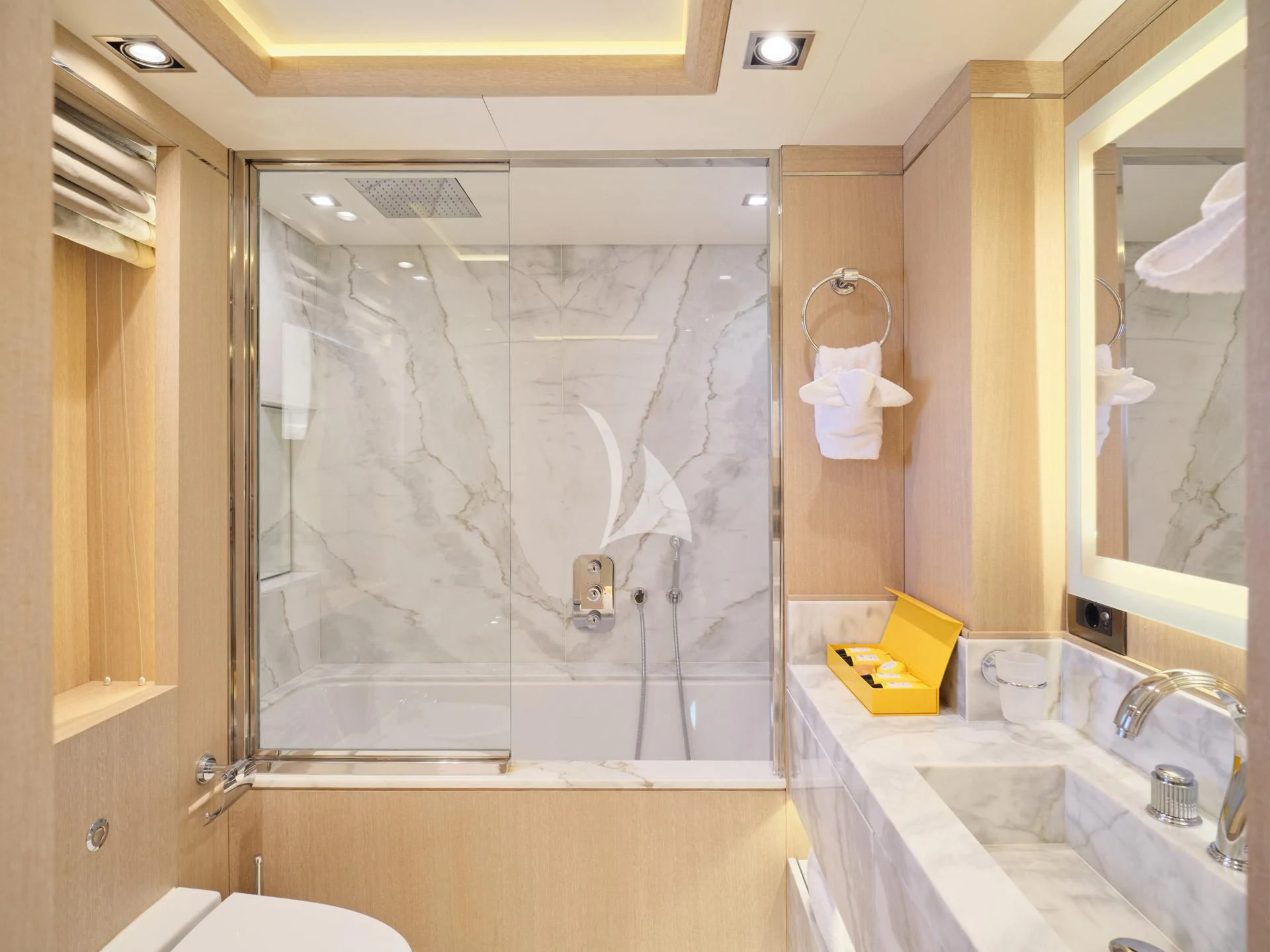 a bathroom with a glass shower aboard JAZ Yacht for Charter