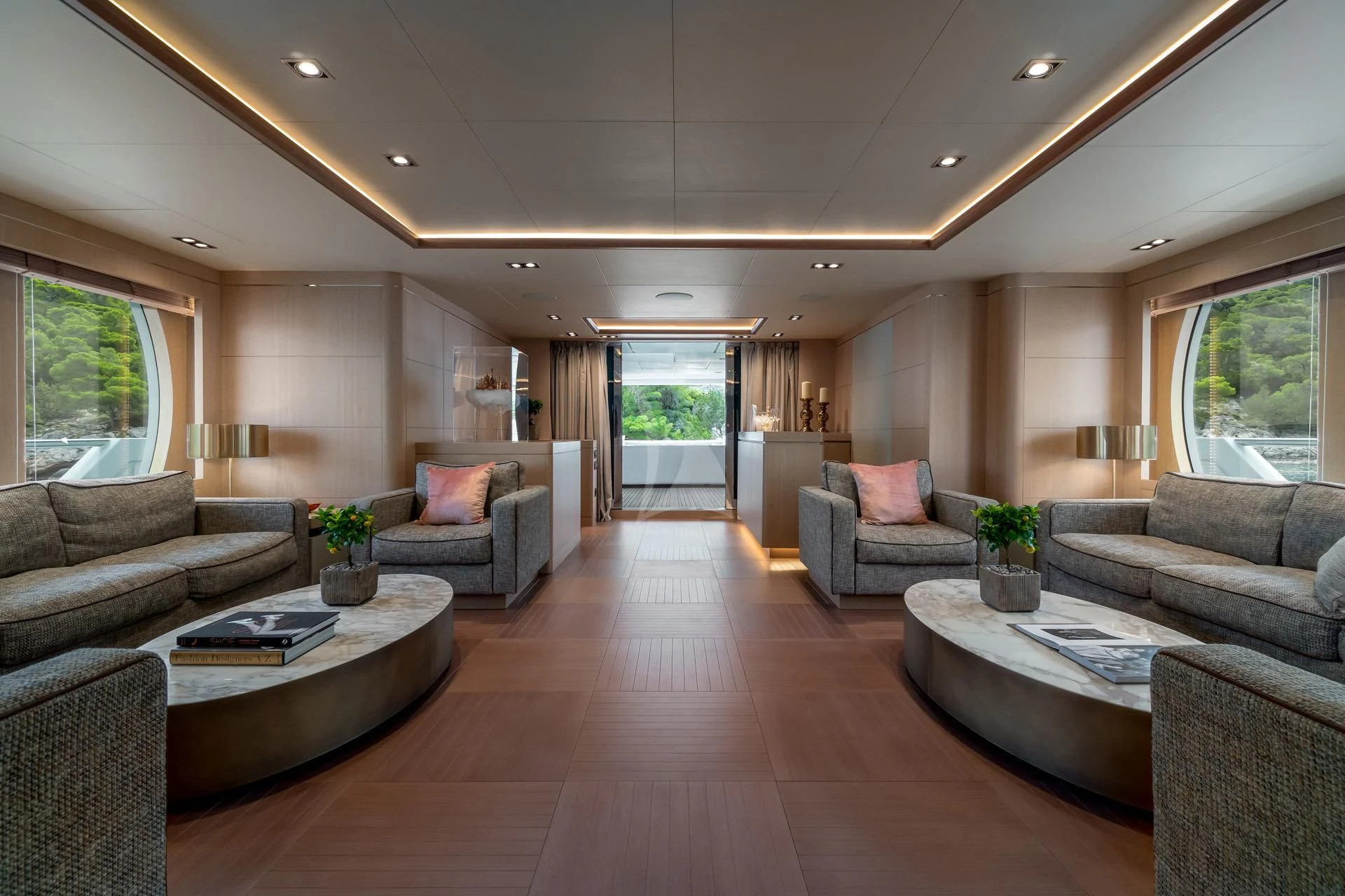 a living room with a large window aboard JAZ Yacht for Charter