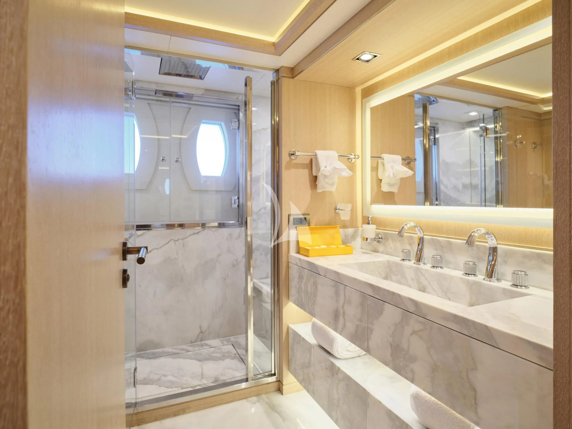 a bathroom with a glass shower aboard JAZ Yacht for Charter