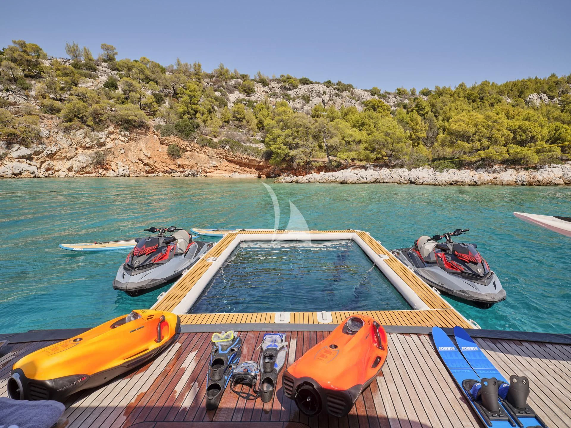 boats docked at a pier aboard JAZ Yacht for Charter
