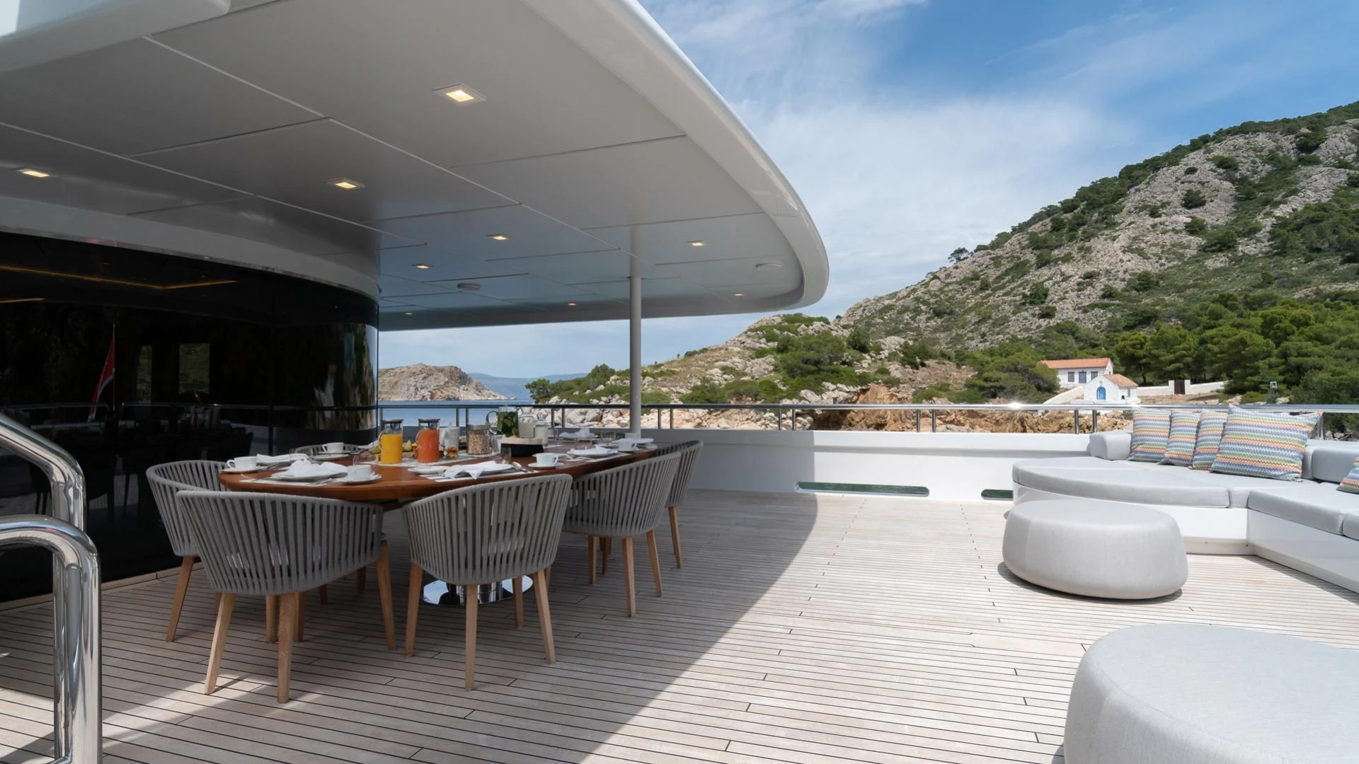 a patio with a table and chairs aboard JAZ Yacht for Charter