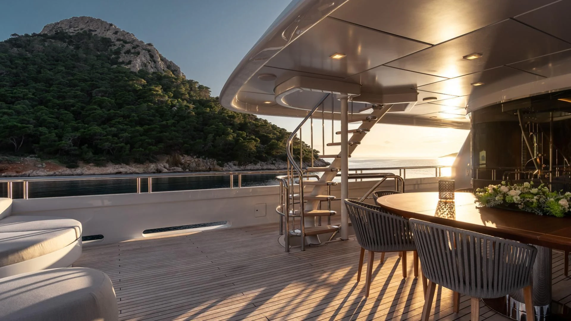 a room with a table and chairs aboard JAZ Yacht for Charter