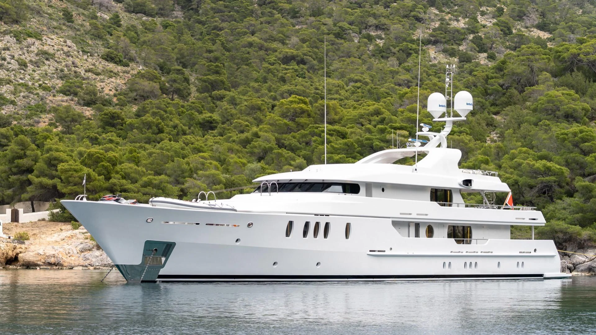 a white yacht on the water aboard JAZ Yacht for Charter