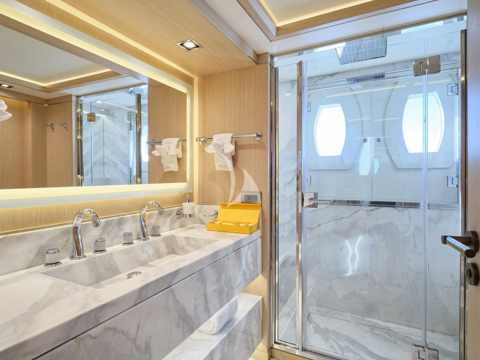 a bathroom with a glass shower aboard JAZ Yacht for Charter