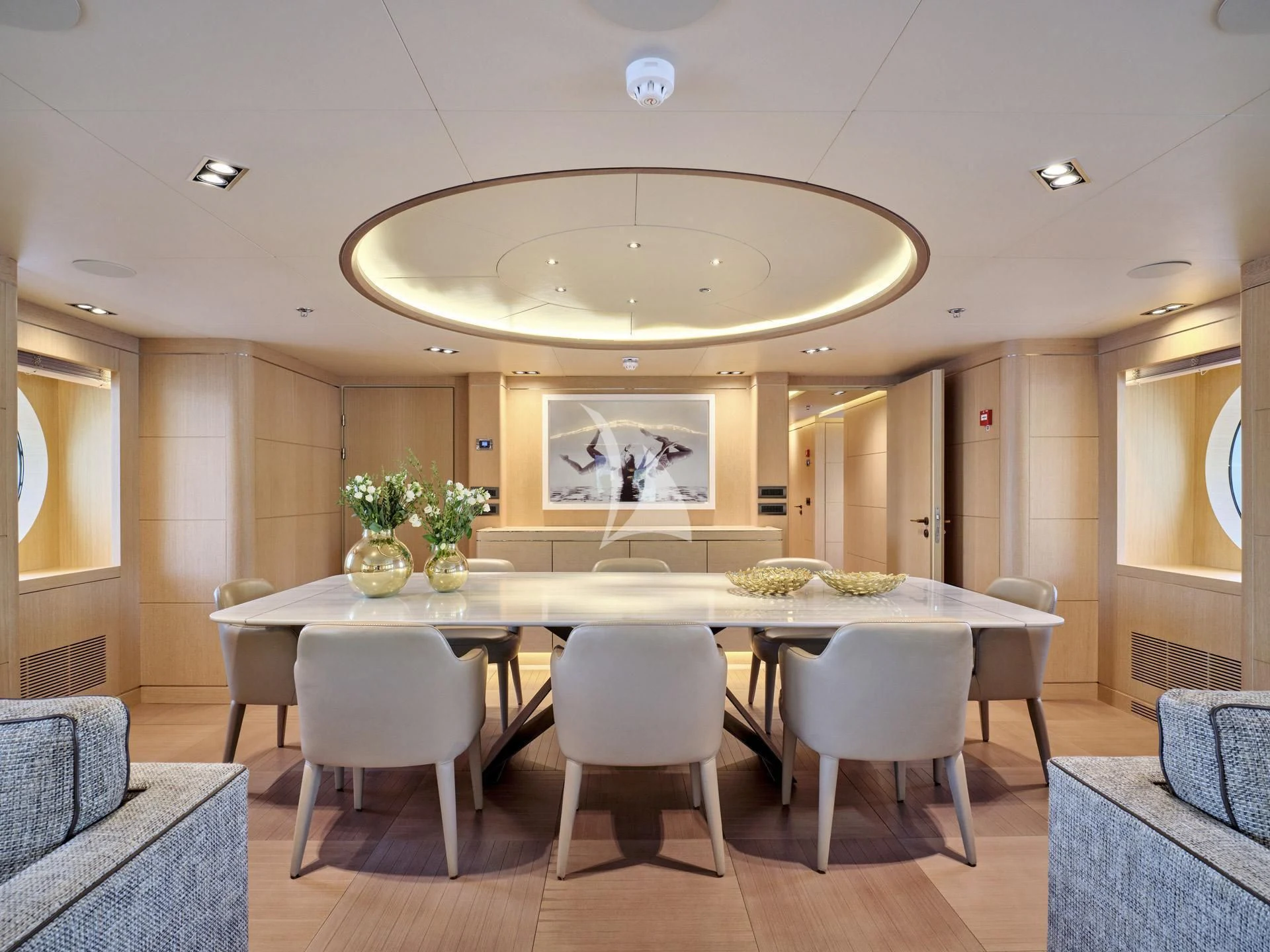 a large kitchen with a table and chairs aboard JAZ Yacht for Charter