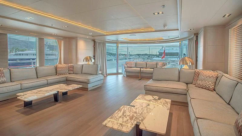 a living room with a large window aboard JAZ Yacht for Charter