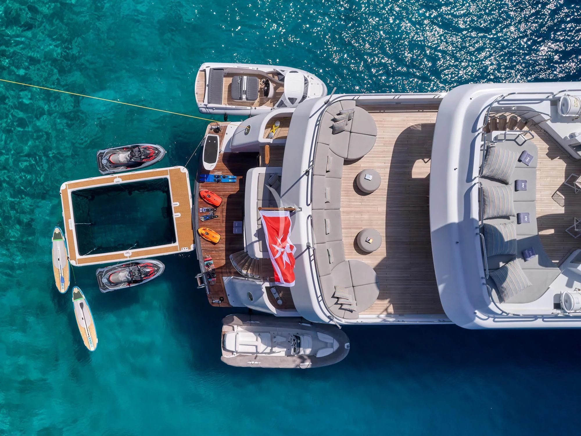a group of boats in the water aboard JAZ Yacht for Charter