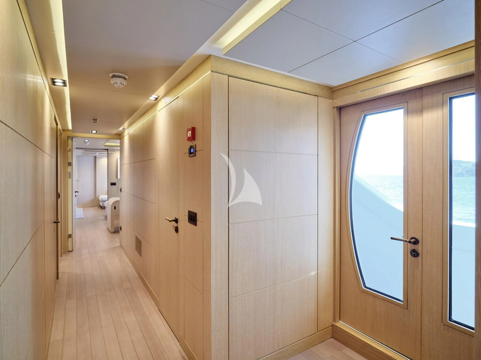 a room with doors and windows aboard JAZ Yacht for Charter