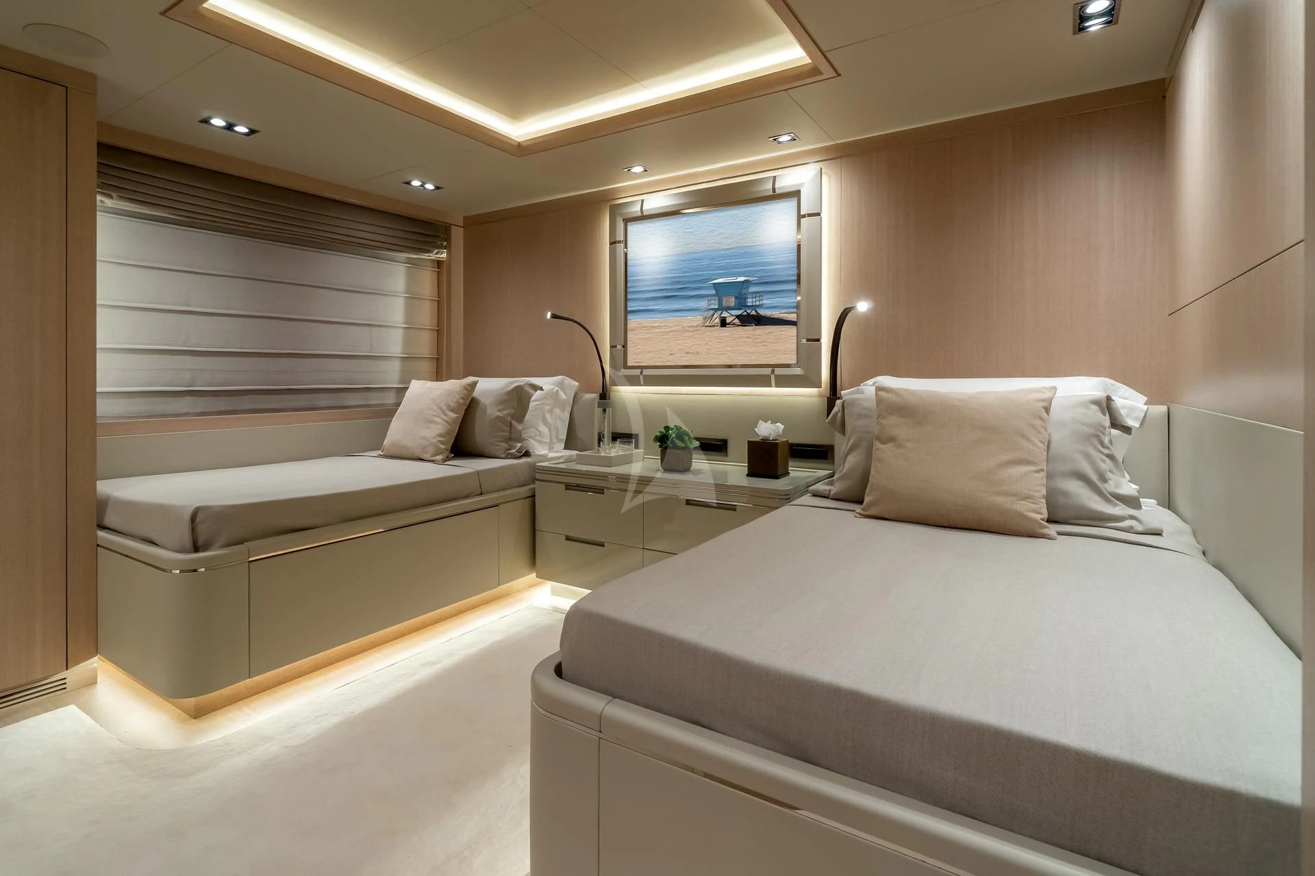 a room with two beds aboard JAZ Yacht for Charter