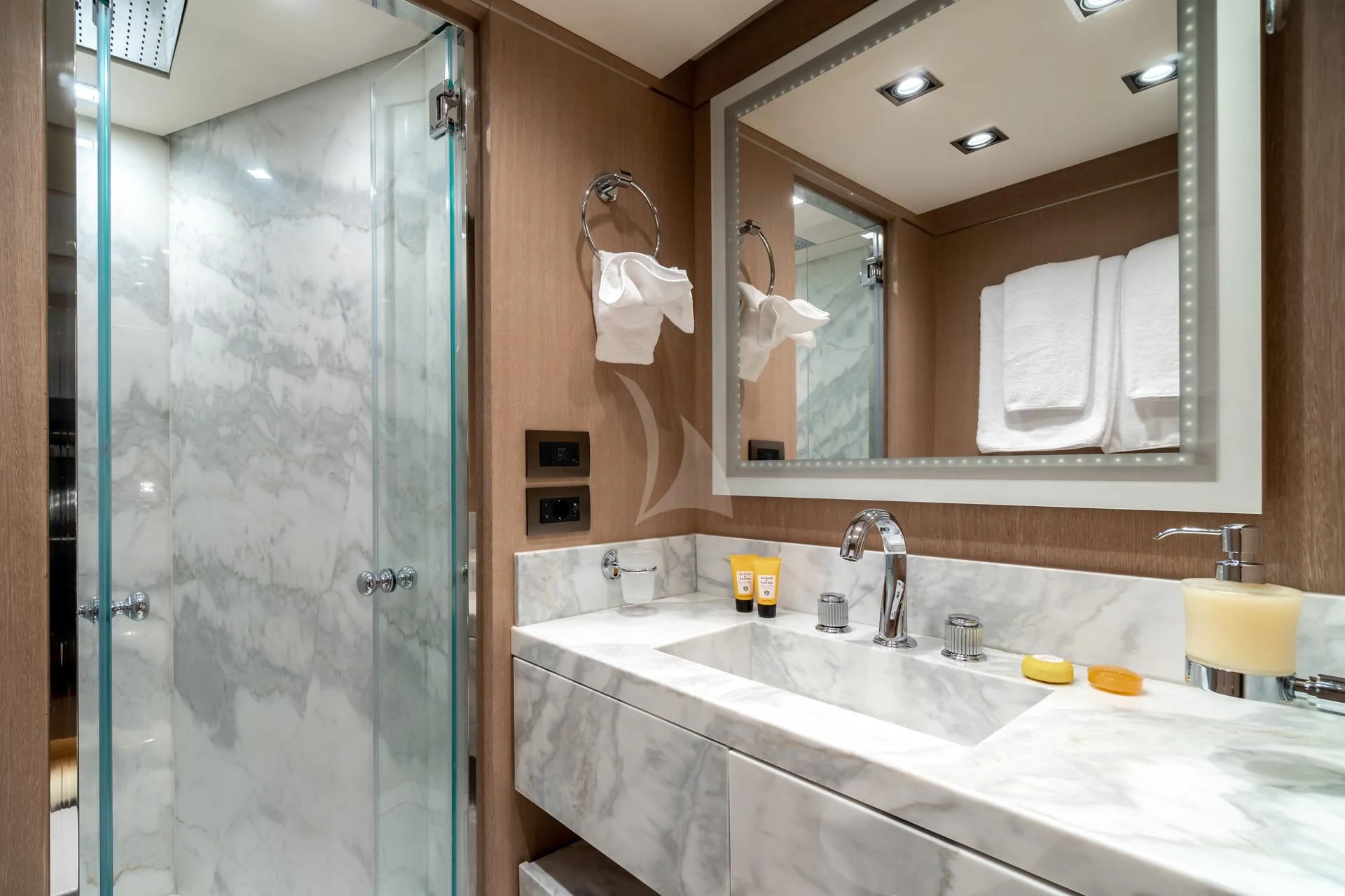a bathroom with a glass shower aboard JAZ Yacht for Charter