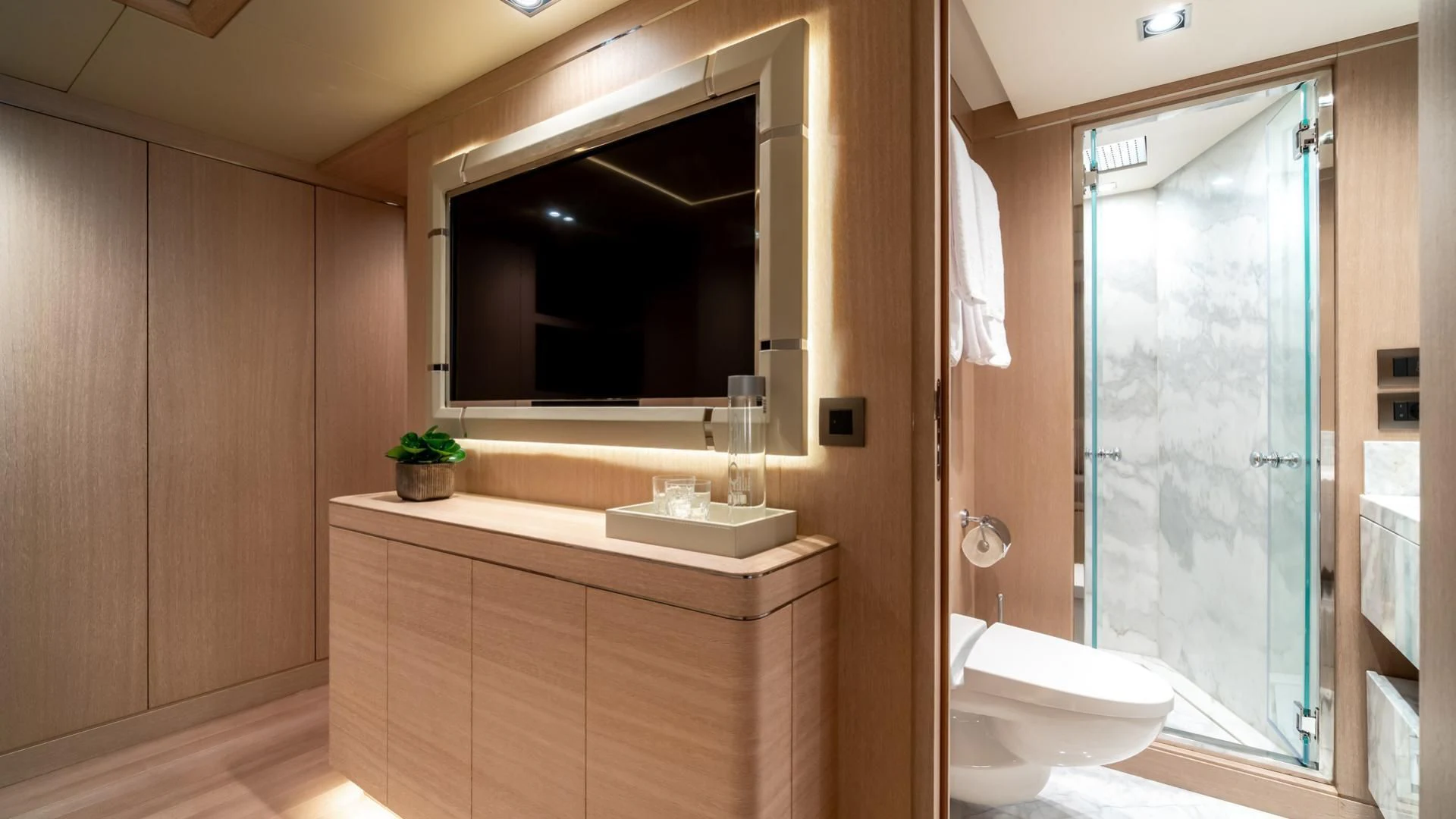a bathroom with a tub sink and a shower unit aboard JAZ Yacht for Charter