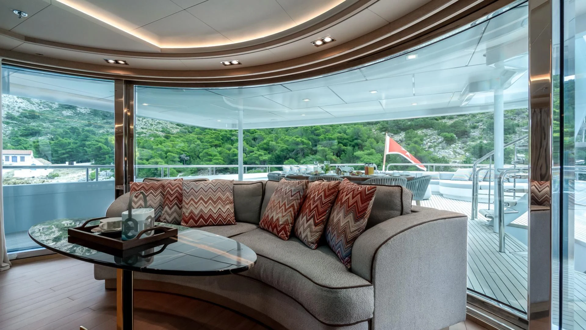a couch in a room aboard JAZ Yacht for Charter