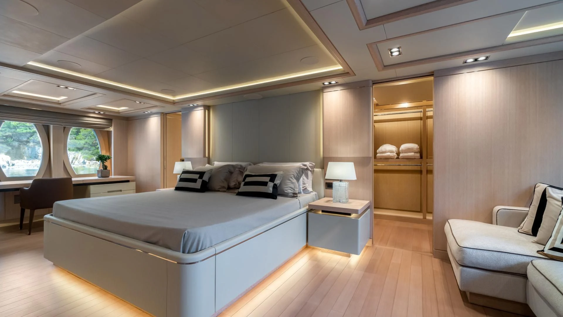 a large bedroom with a bed aboard JAZ Yacht for Charter