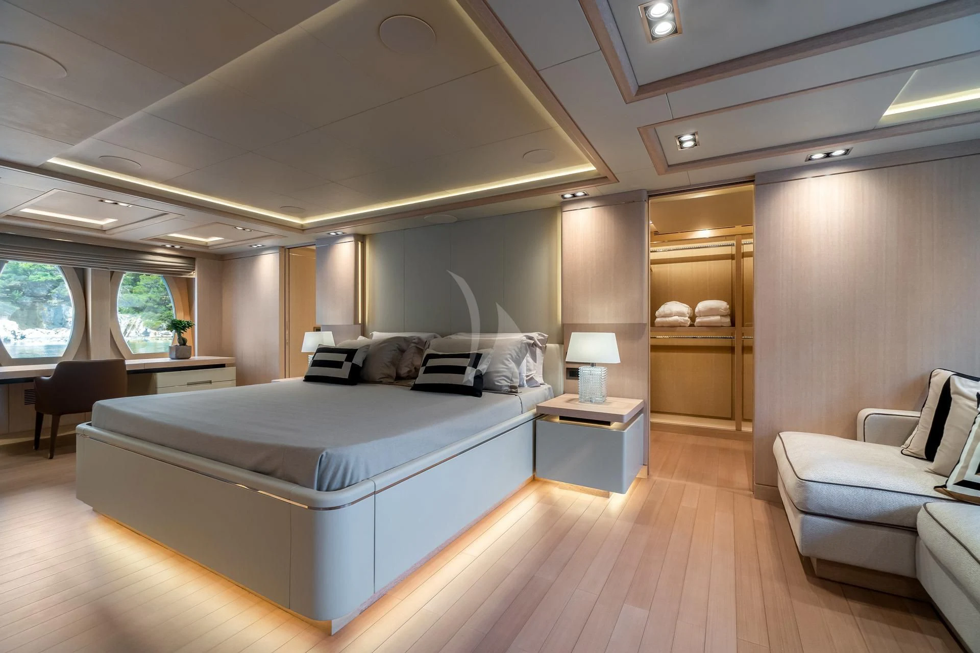 a large bedroom with a large bed aboard JAZ Yacht for Charter