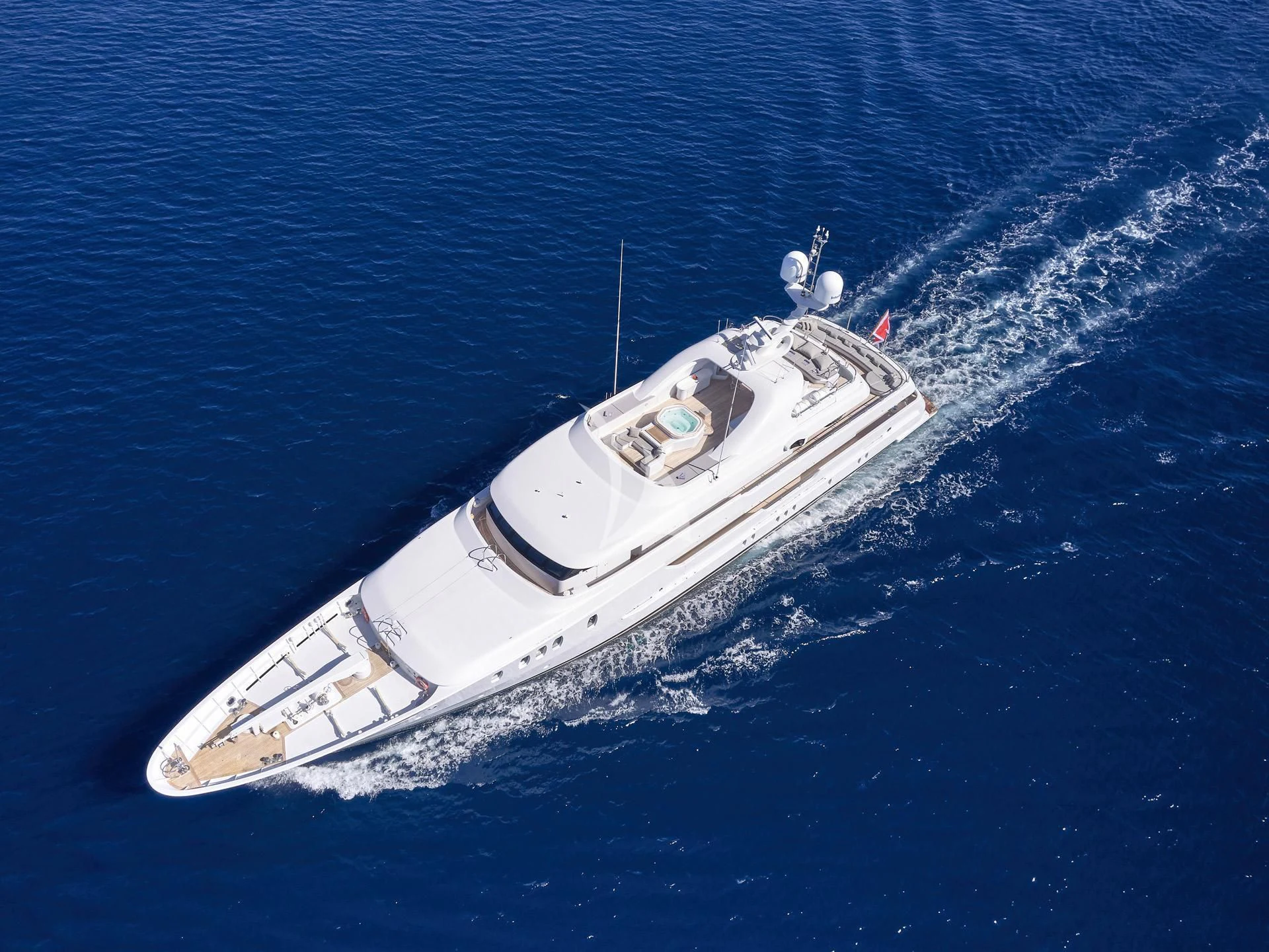 a white boat in the water aboard JAZ Yacht for Charter