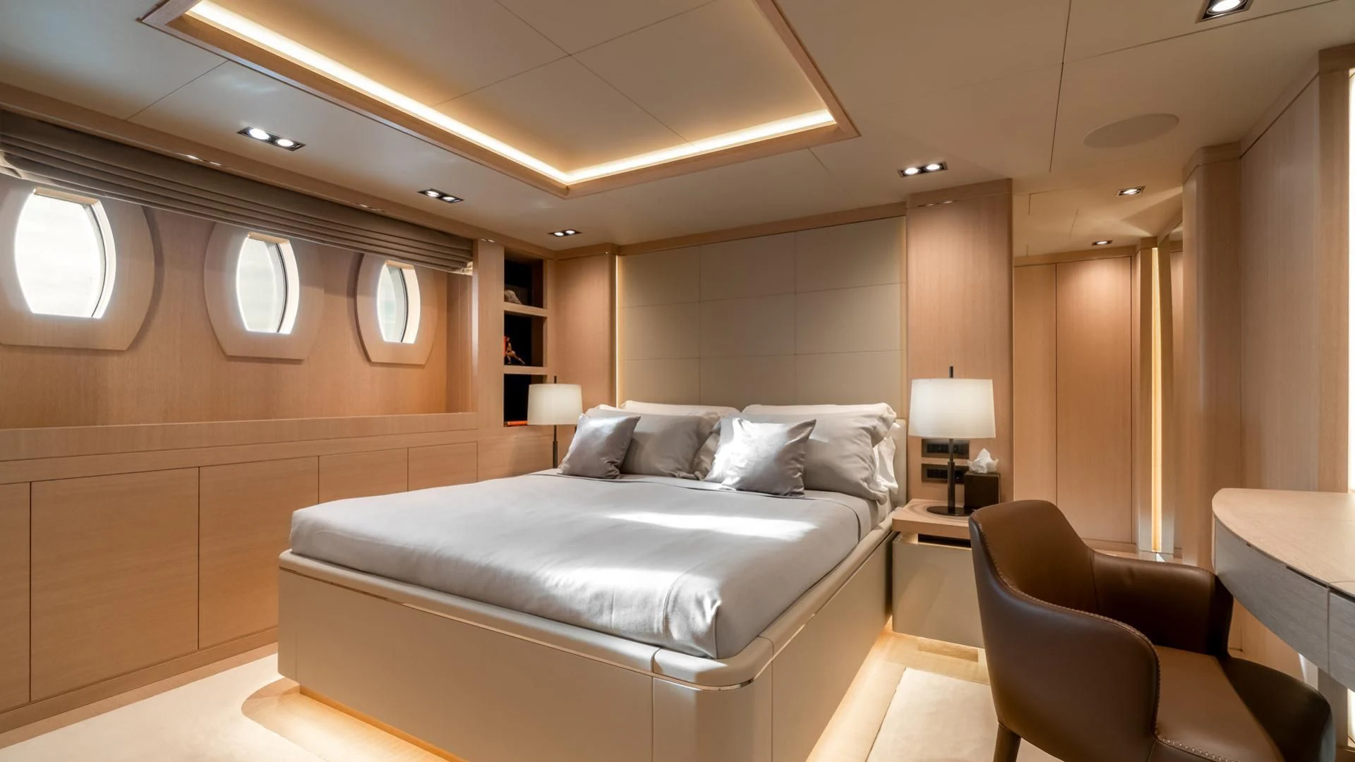 a large bed in a room aboard JAZ Yacht for Charter
