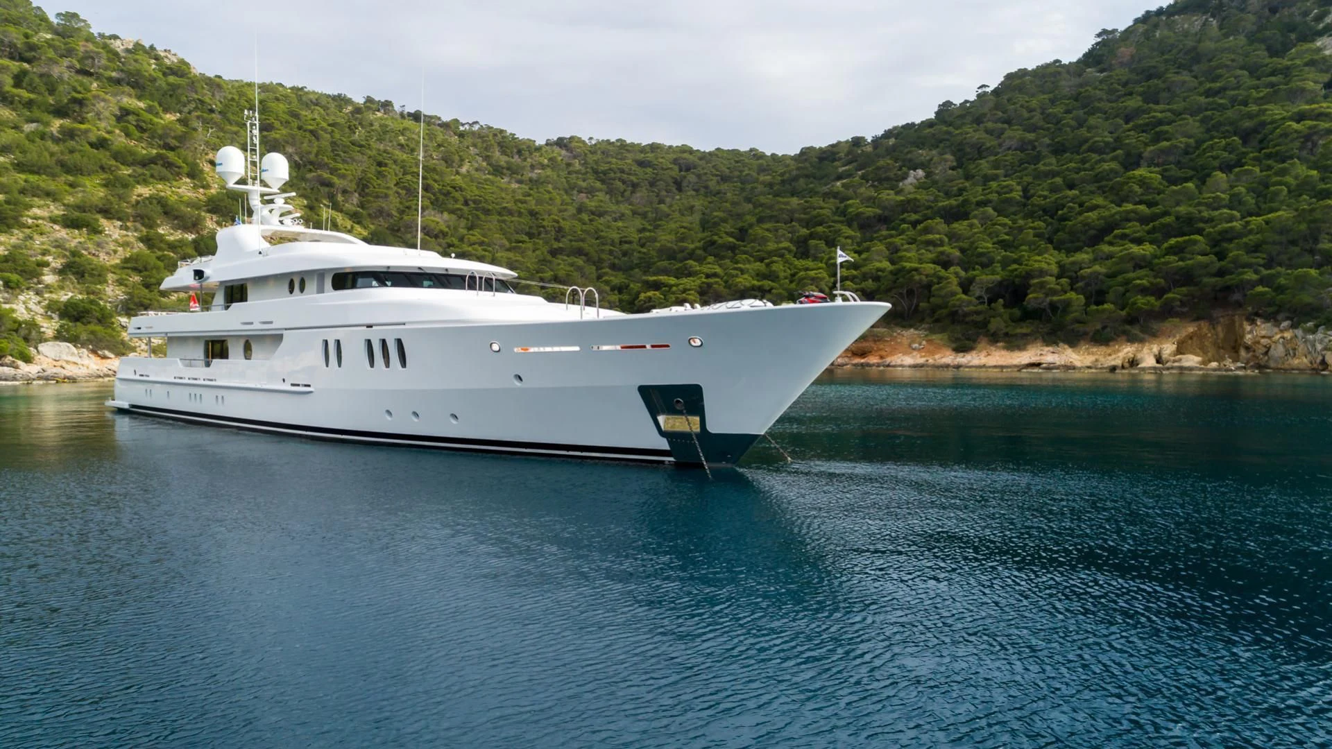 a white boat in the water aboard JAZ Yacht for Charter