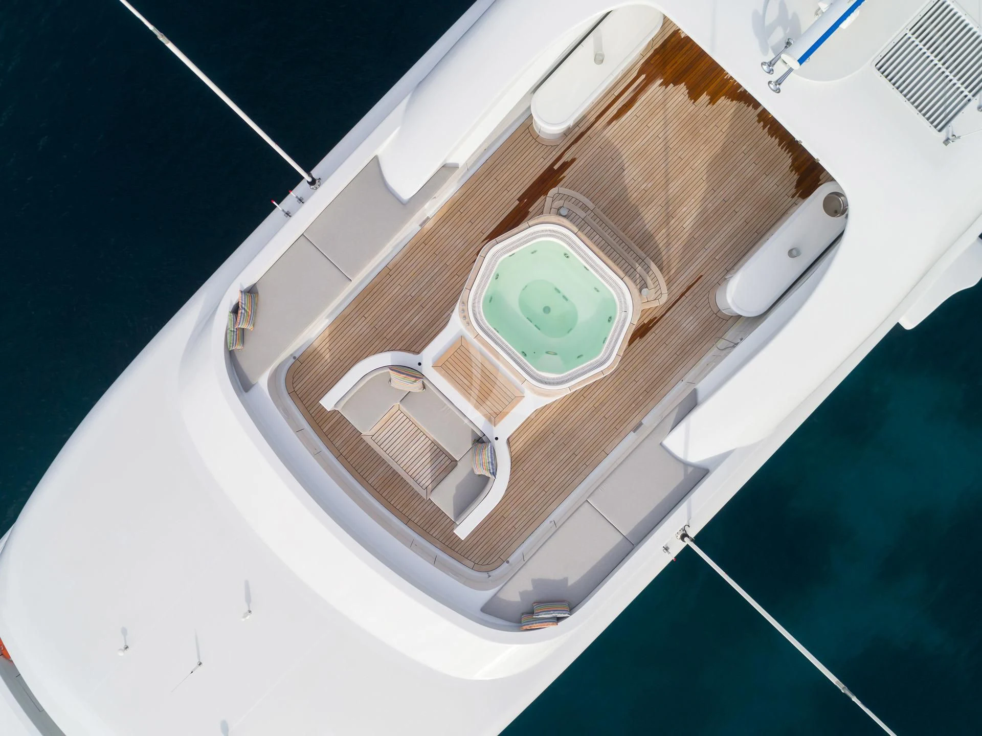 a white rectangular object with a green circle on it aboard JAZ Yacht for Charter