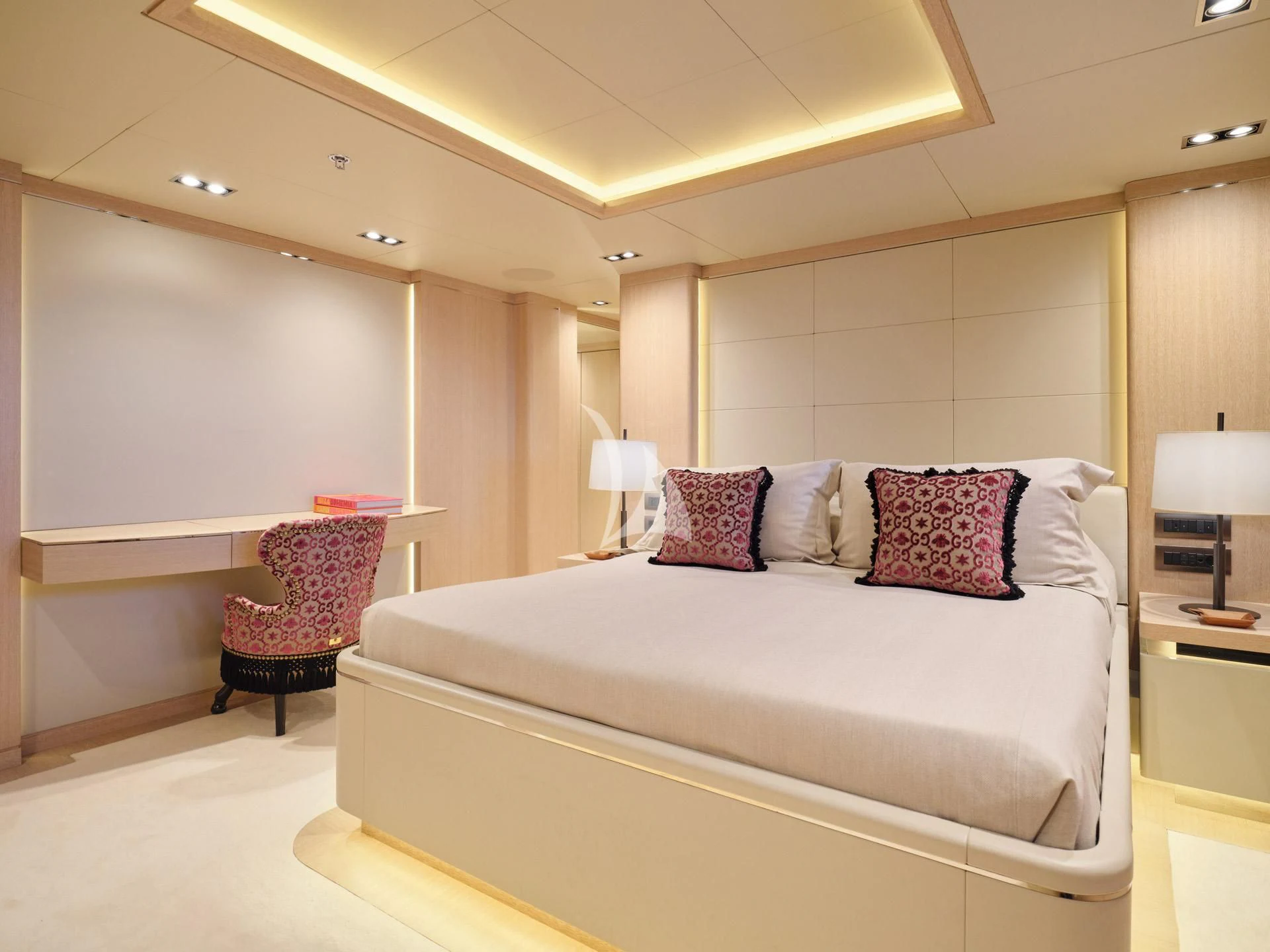 a bed with pillows and pillows aboard JAZ Yacht for Charter
