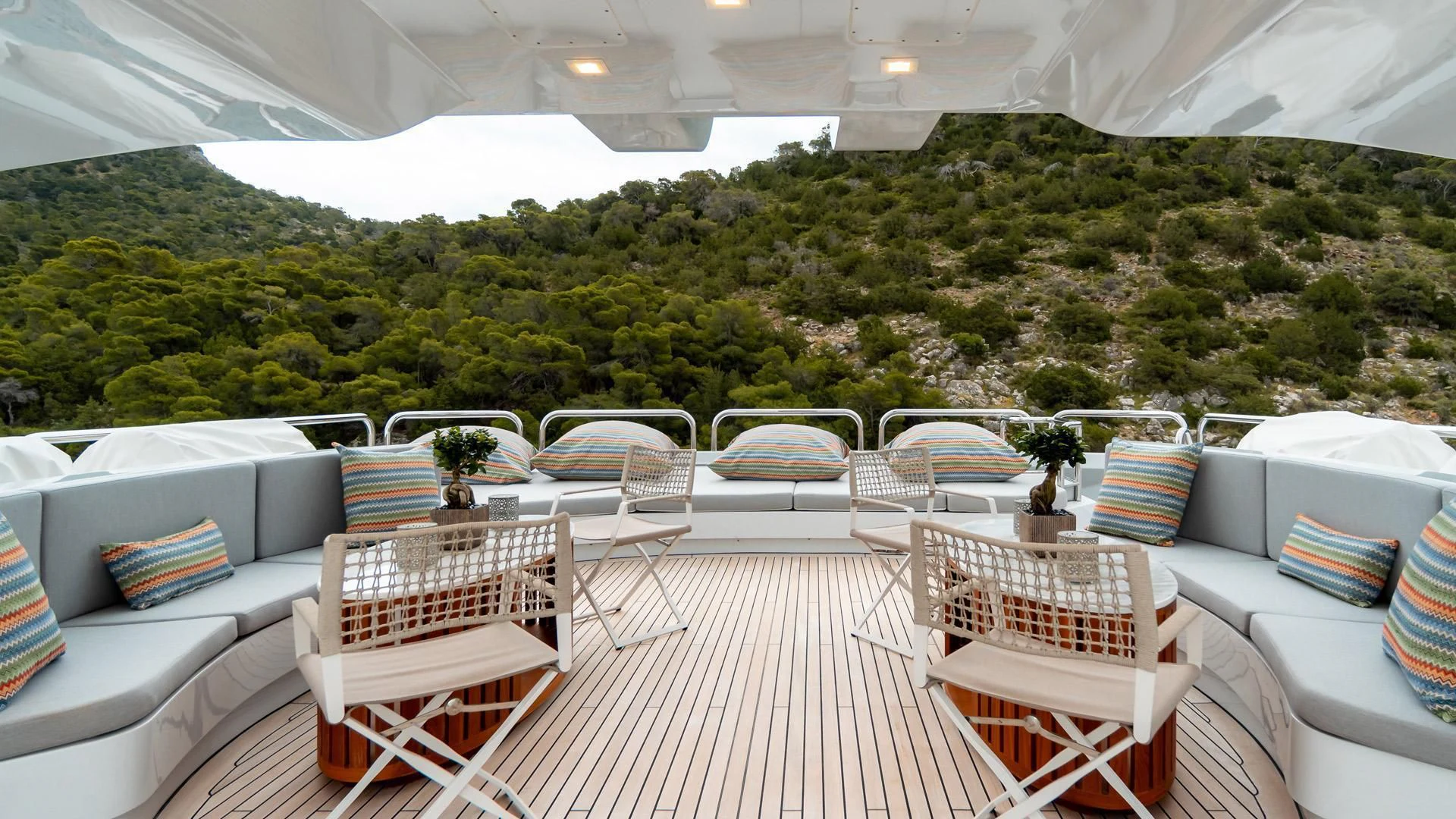 a patio with chairs and tables aboard JAZ Yacht for Charter