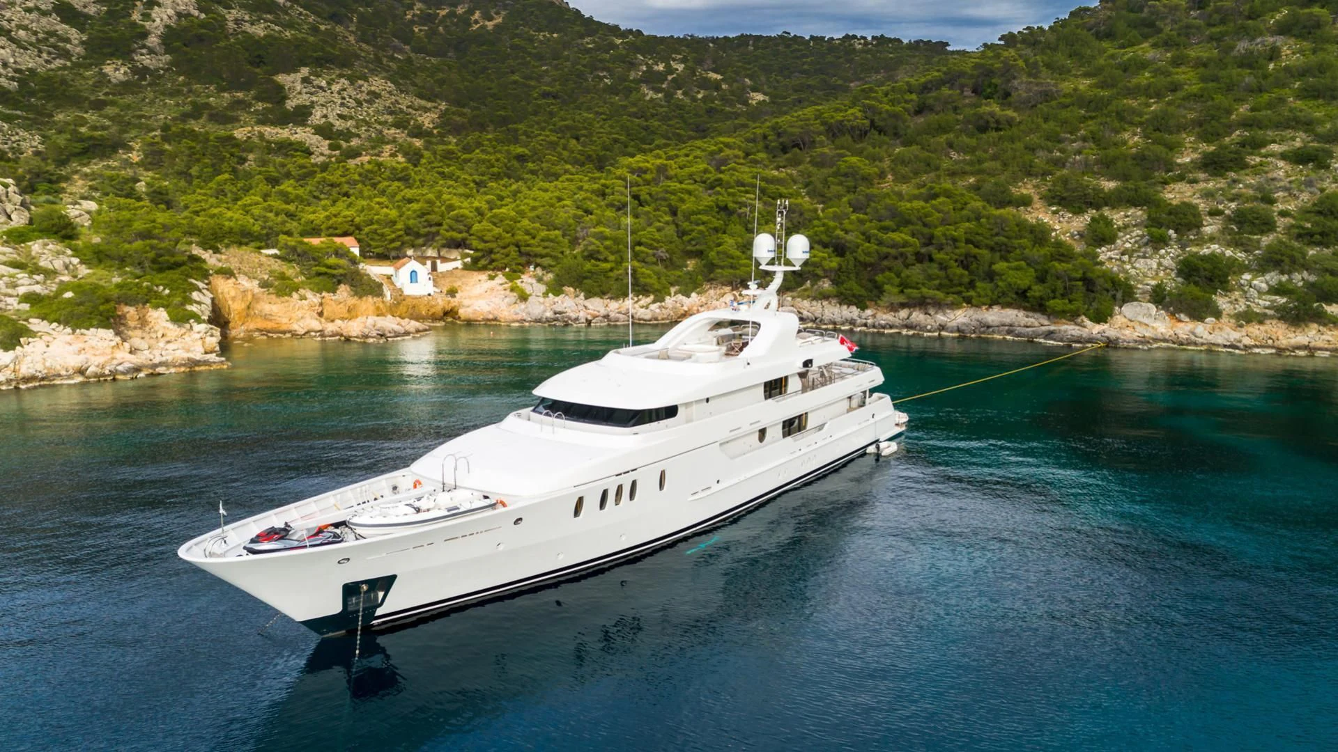 a white yacht in the water aboard JAZ Yacht for Charter