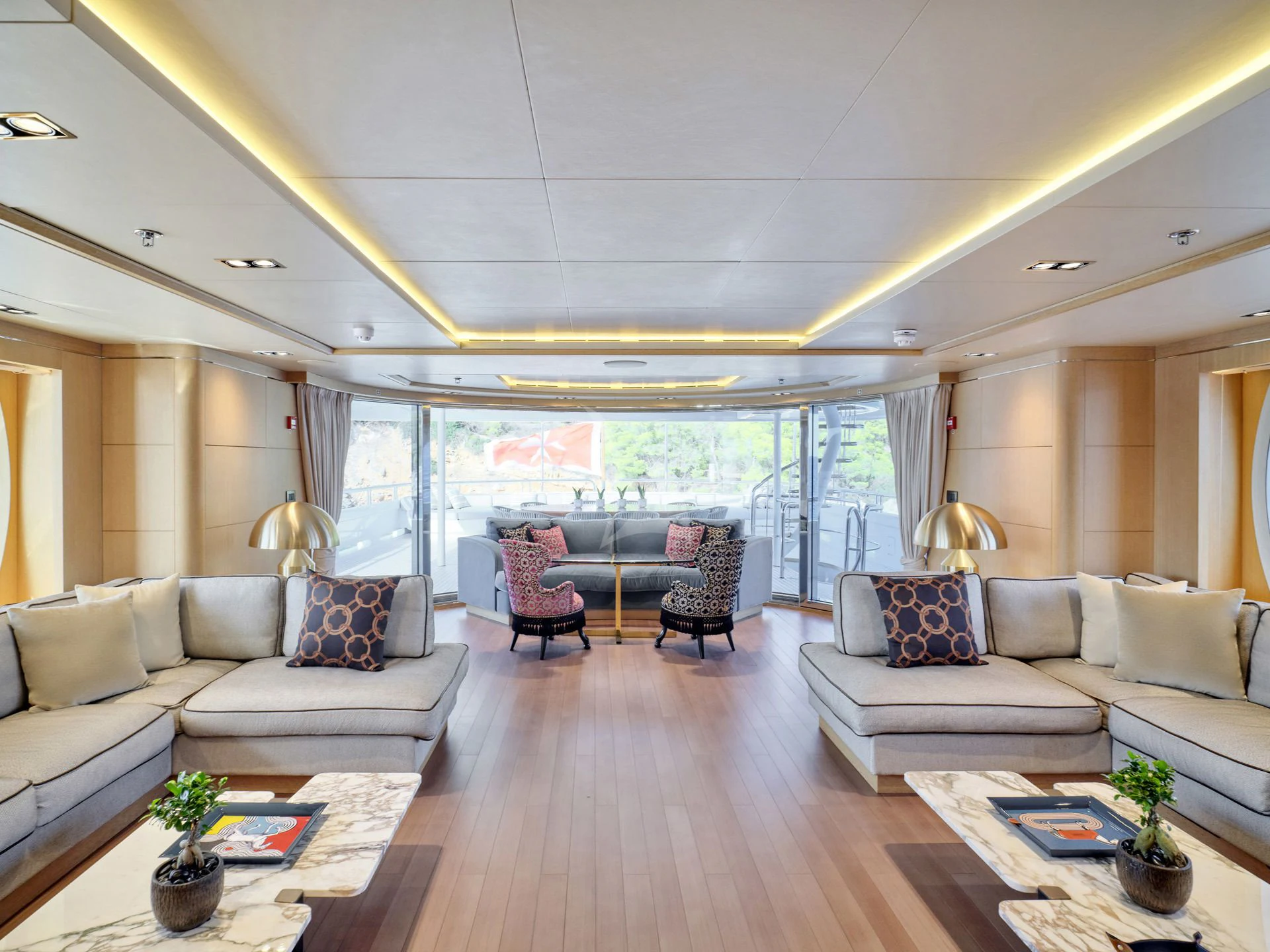 a living room with a large window aboard JAZ Yacht for Charter