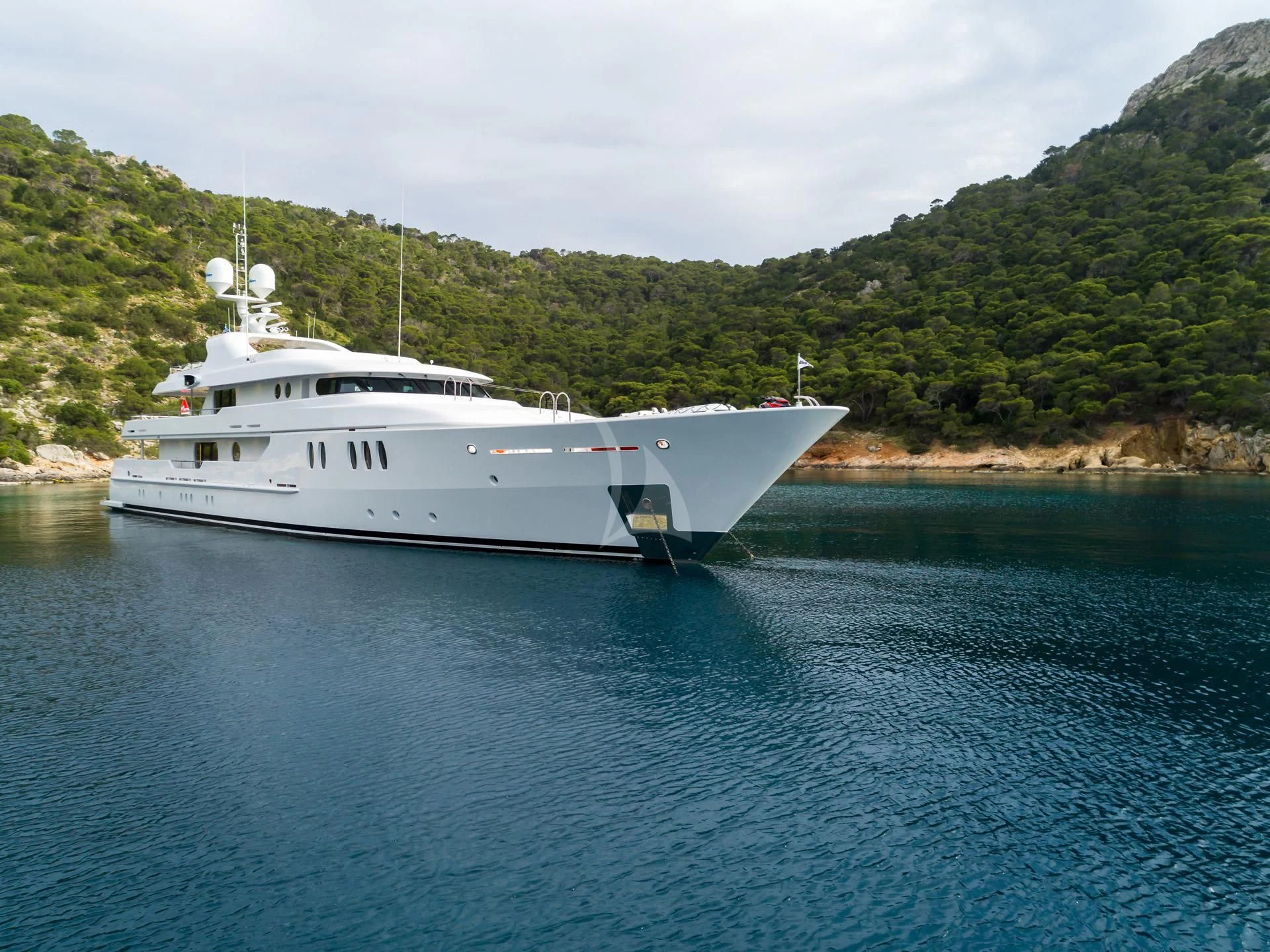 a white boat in the water aboard JAZ Yacht for Charter