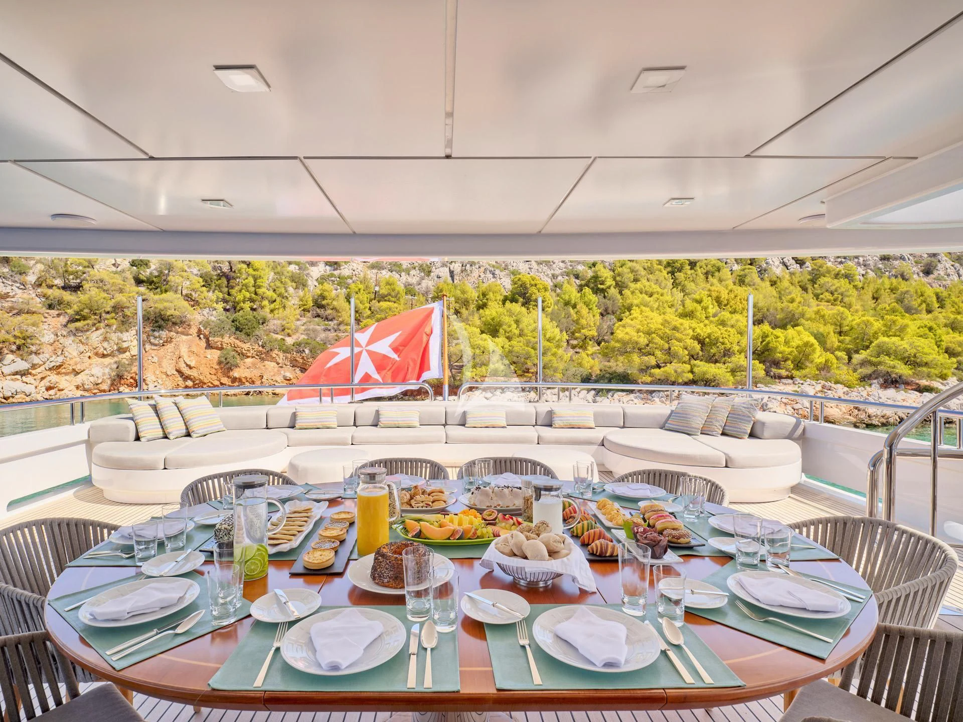 a table set for a meal aboard JAZ Yacht for Charter