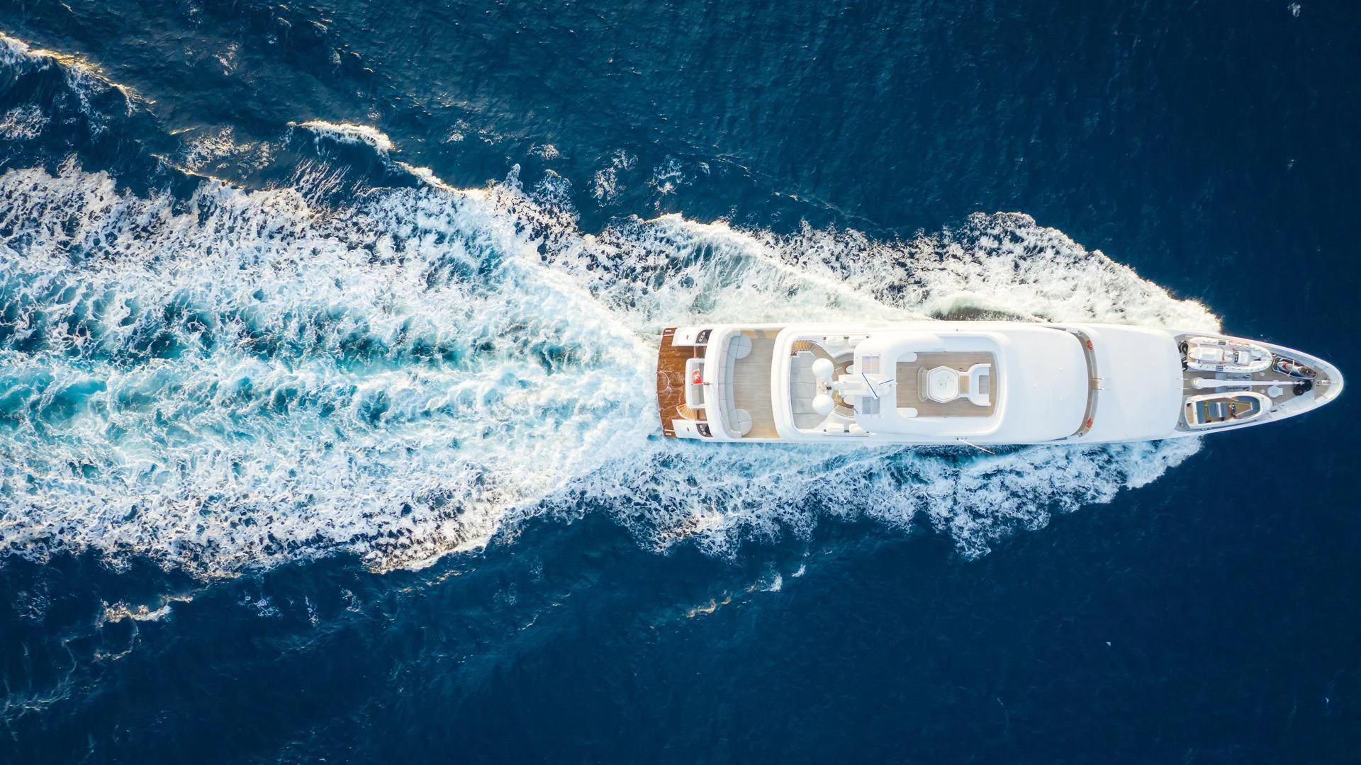 a satellite above the earth aboard JAZ Yacht for Charter