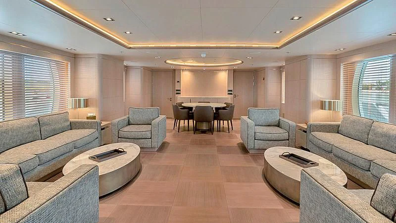 a living room with a couch and a table aboard JAZ Yacht for Charter