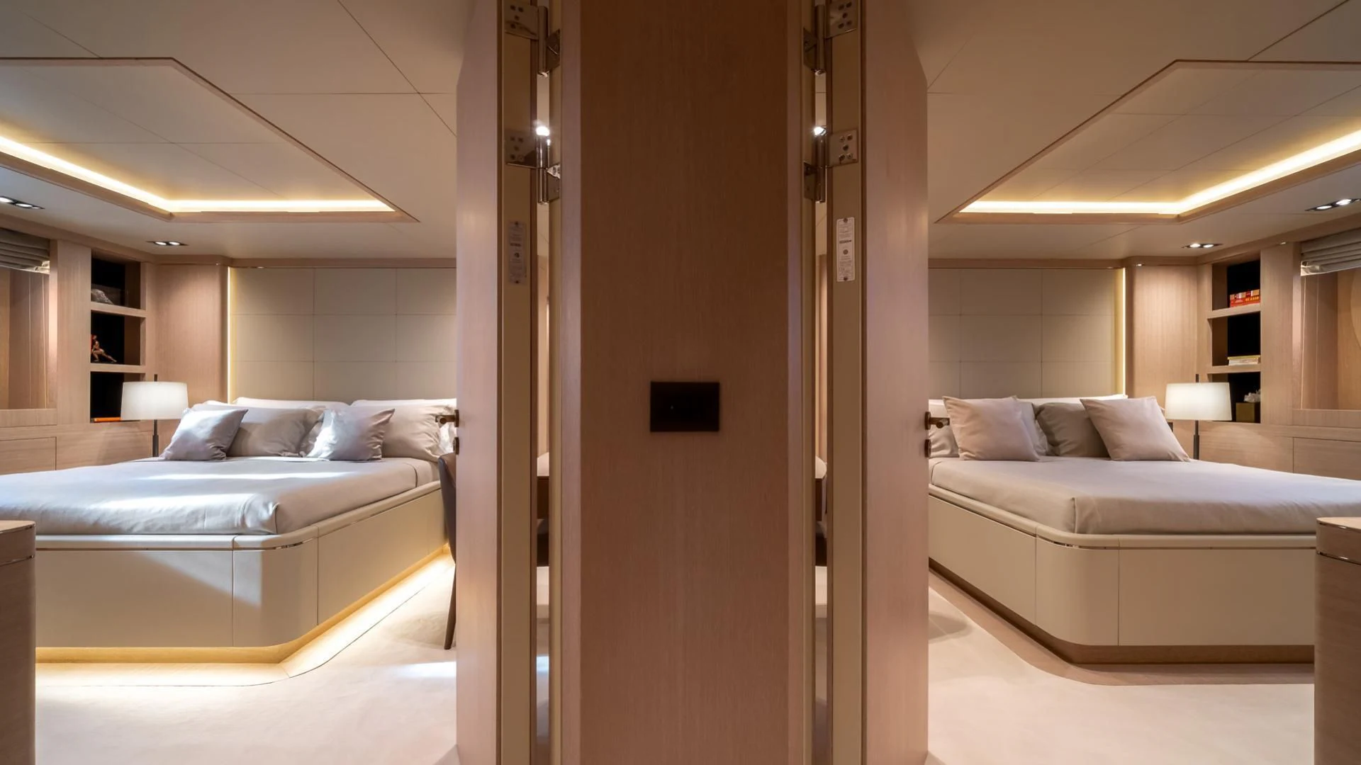 a room with a bed and a couch aboard JAZ Yacht for Charter