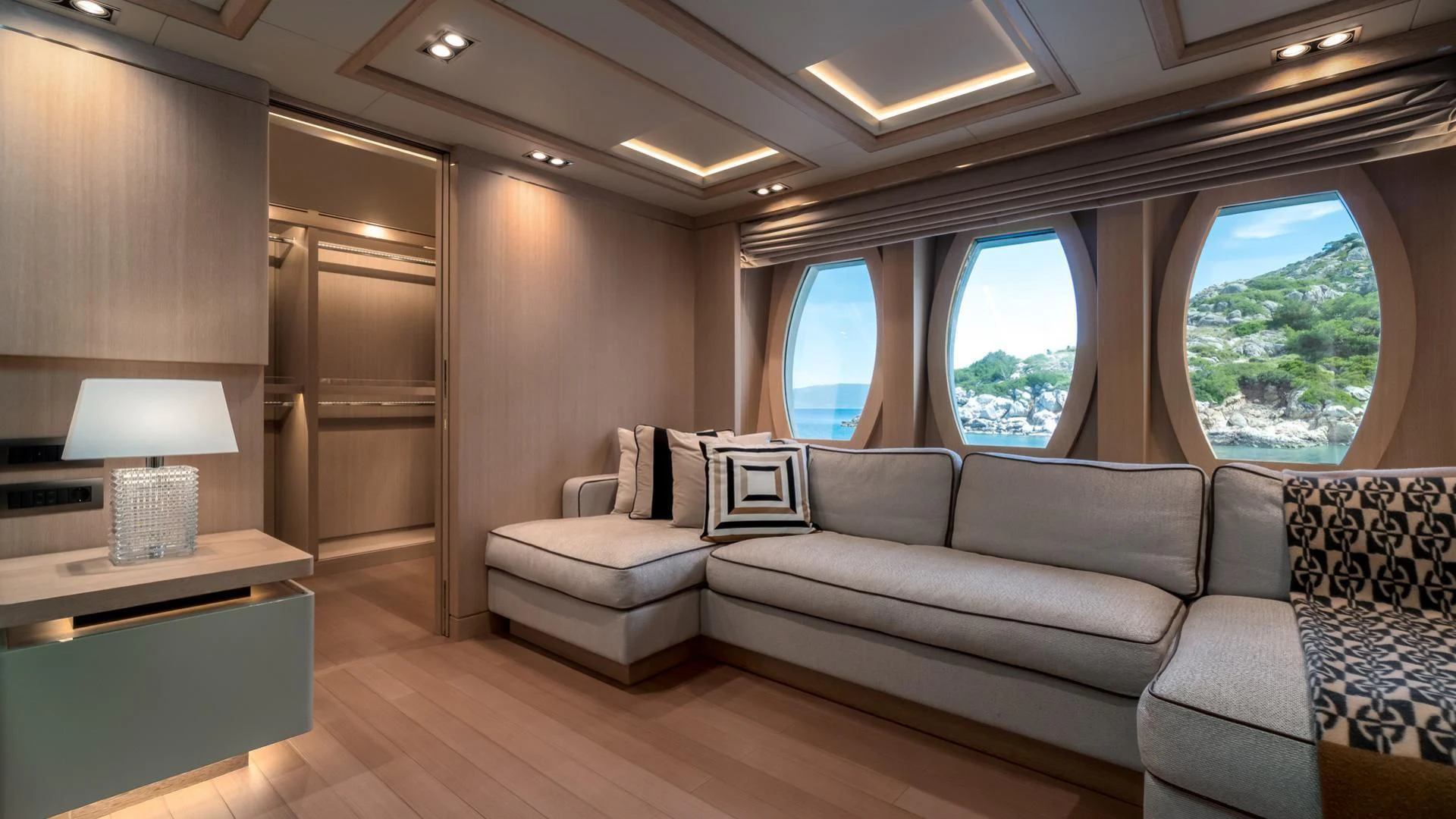 a living room with a couch and a table aboard JAZ Yacht for Charter