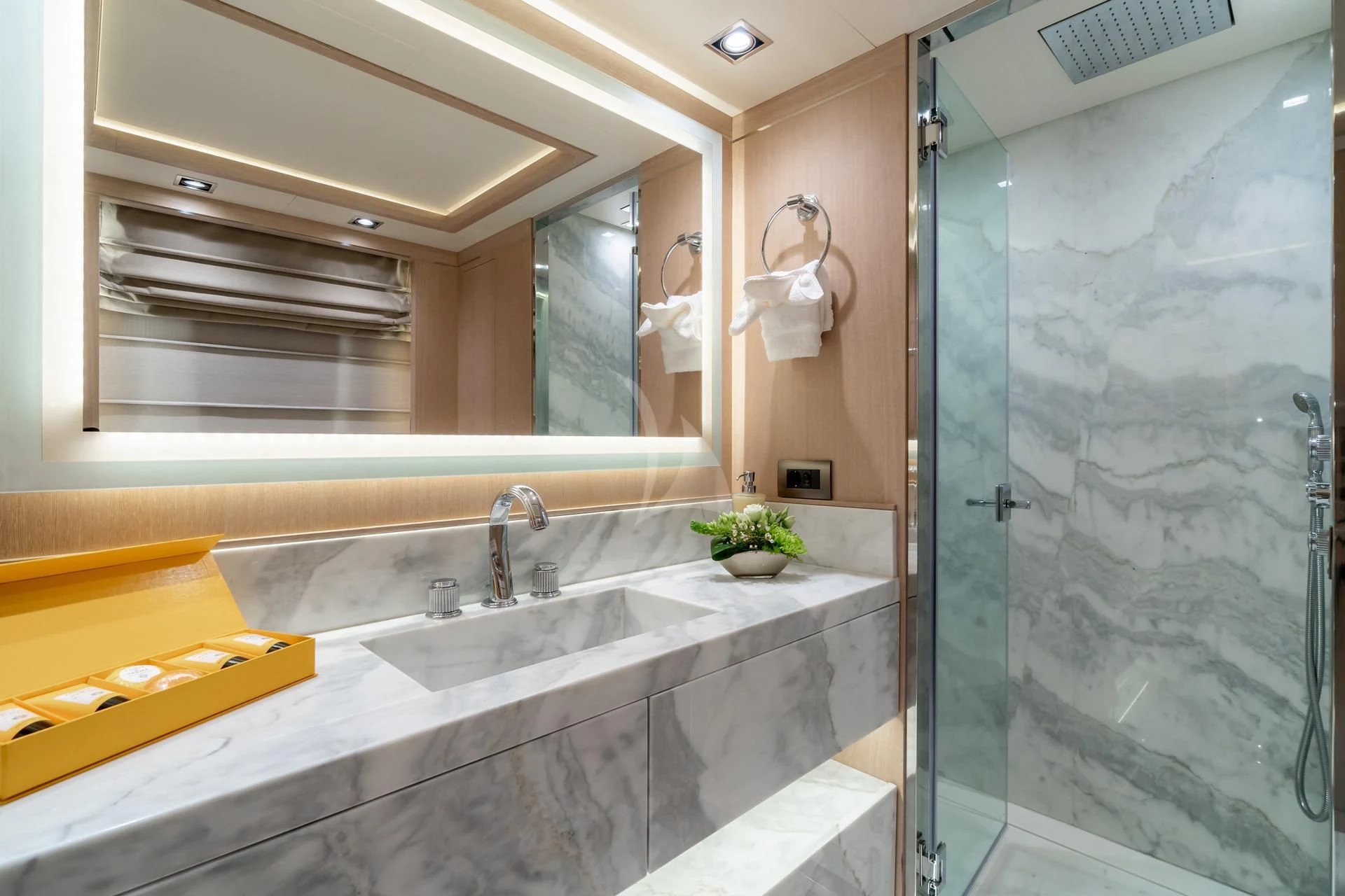a bathroom with a glass shower aboard JAZ Yacht for Charter